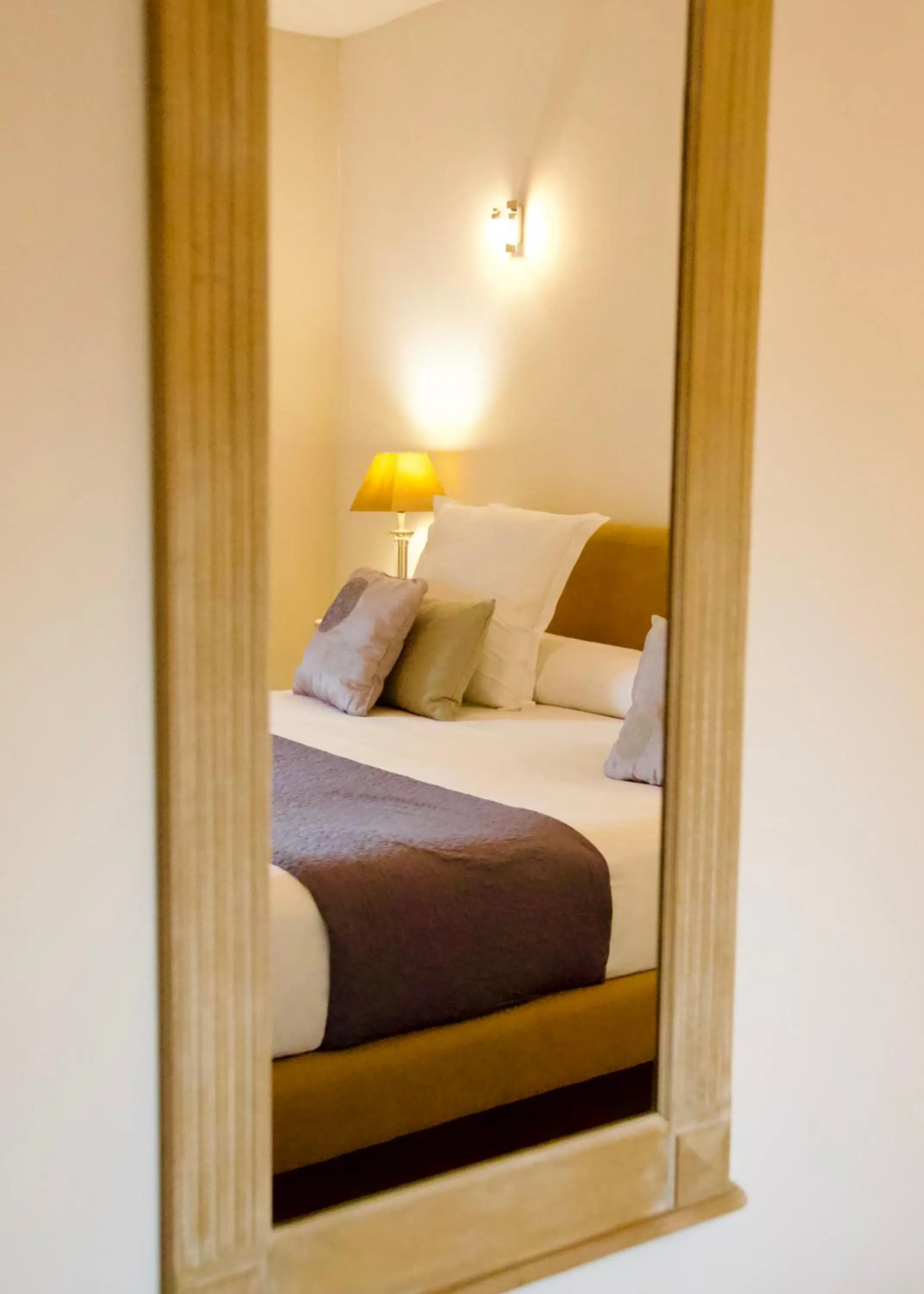 Bed in LA MAISON CIARA - Suites et chambres