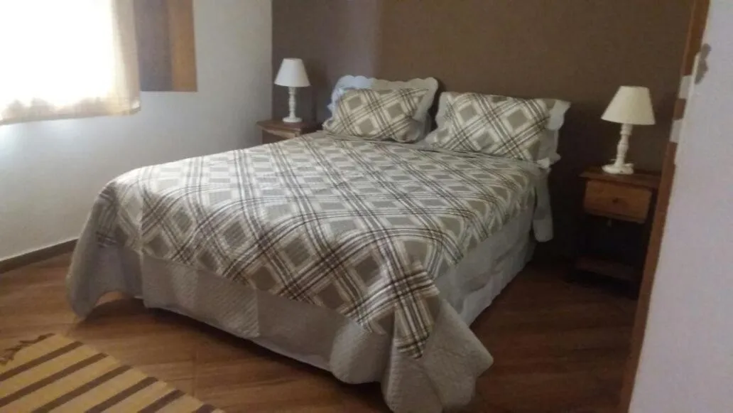 Bed in pousada canarinho