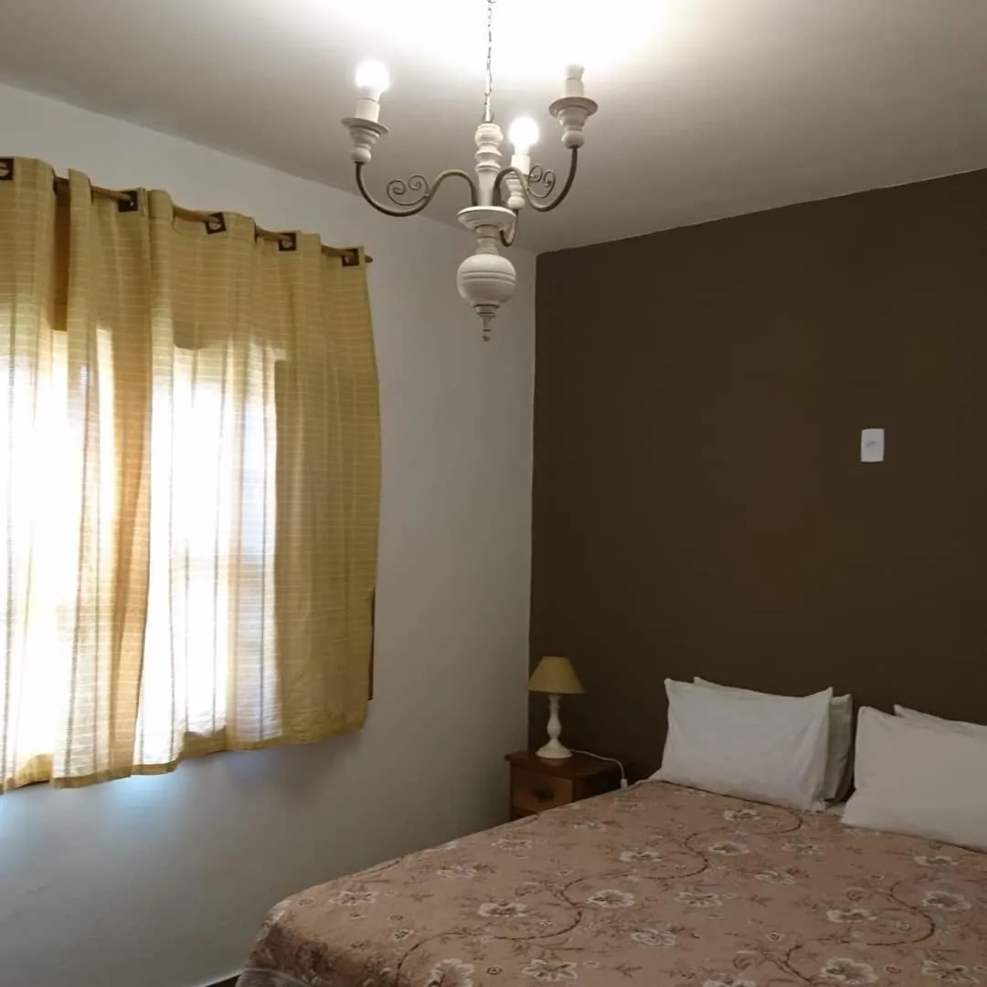 Bed in pousada canarinho