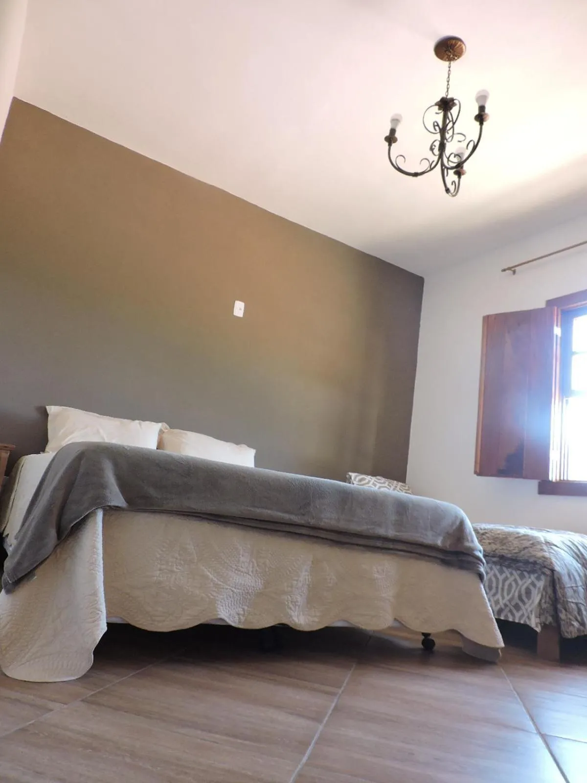 Bed in pousada canarinho