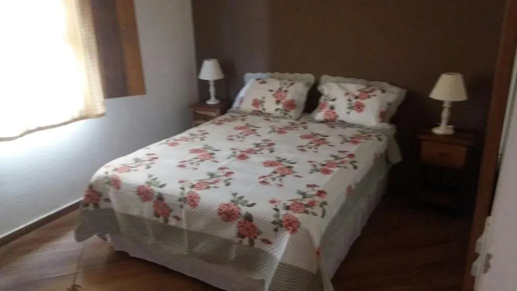 Bed in pousada canarinho