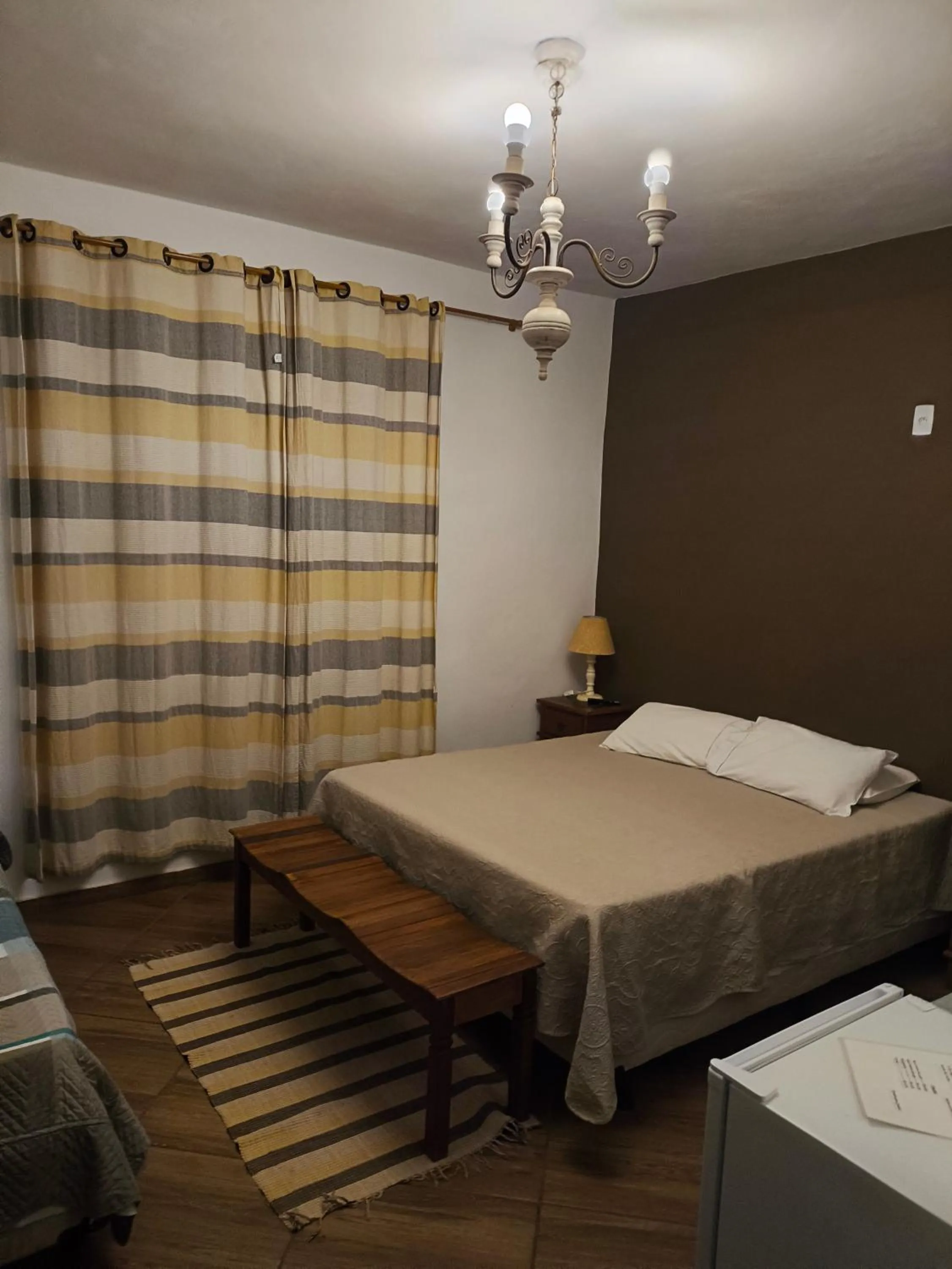 Bed in pousada canarinho