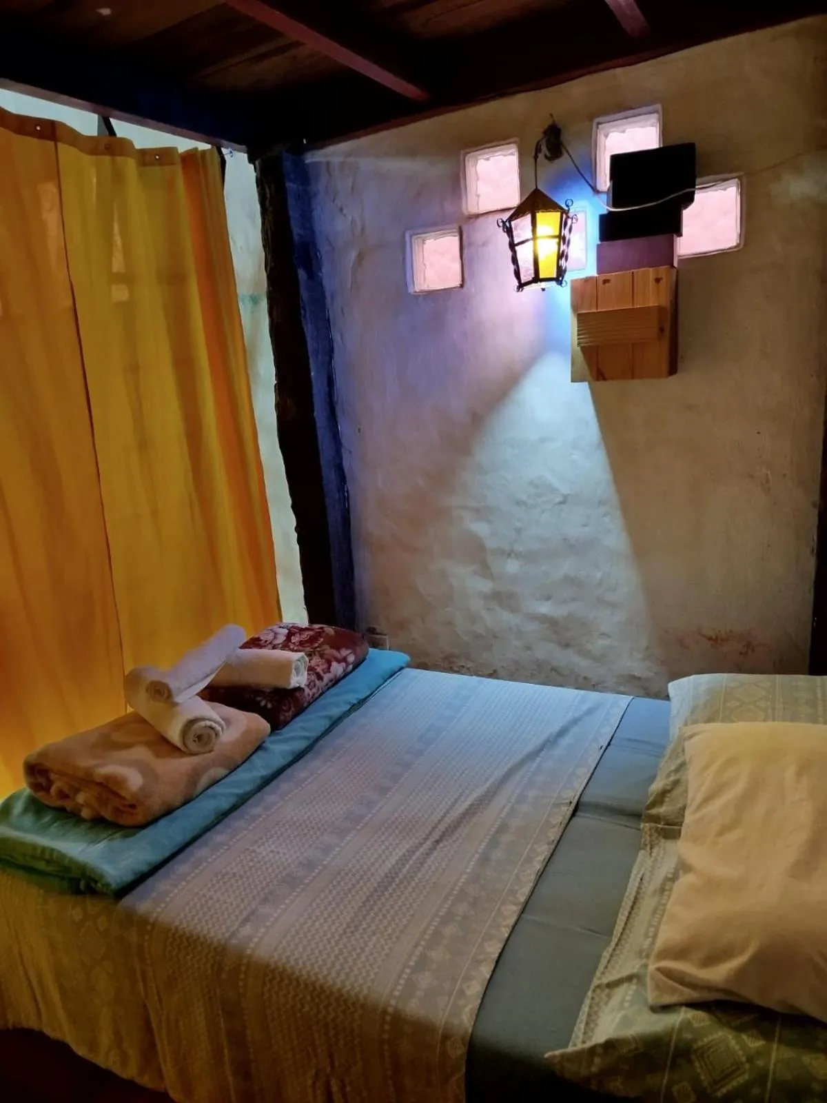 Bed in Chalé de Pedra - Hospedaria