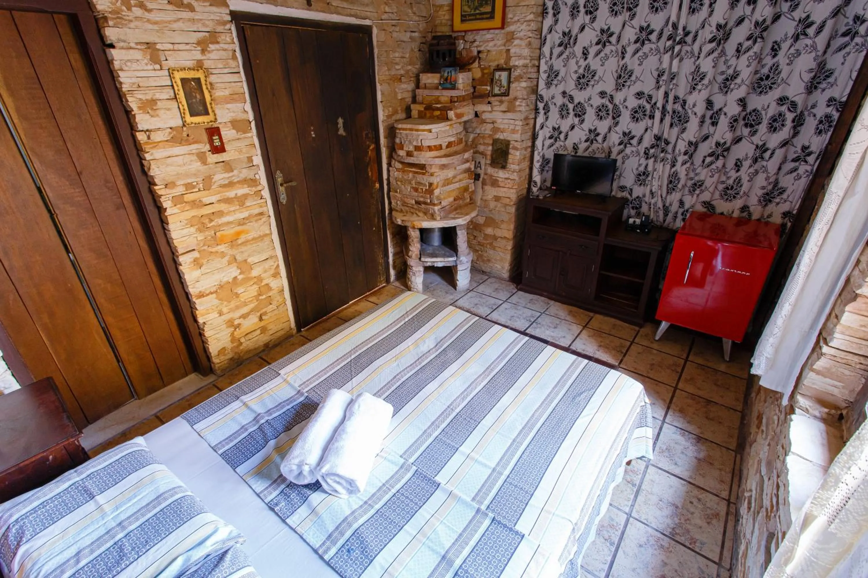 flat iron, Bed in Chalé de Pedra - Hospedaria