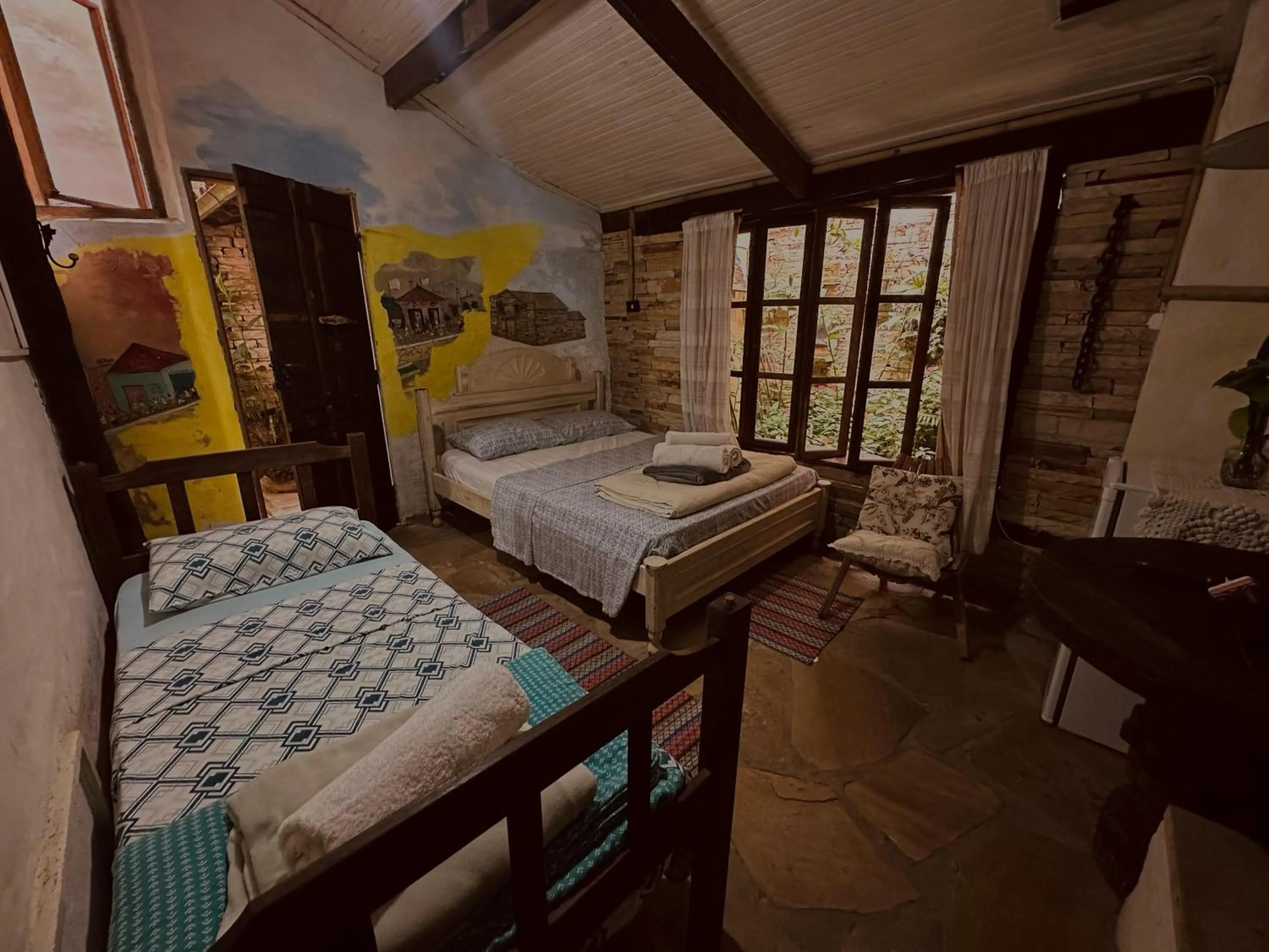 View (from property/room), Bed in Chalé de Pedra - Hospedaria