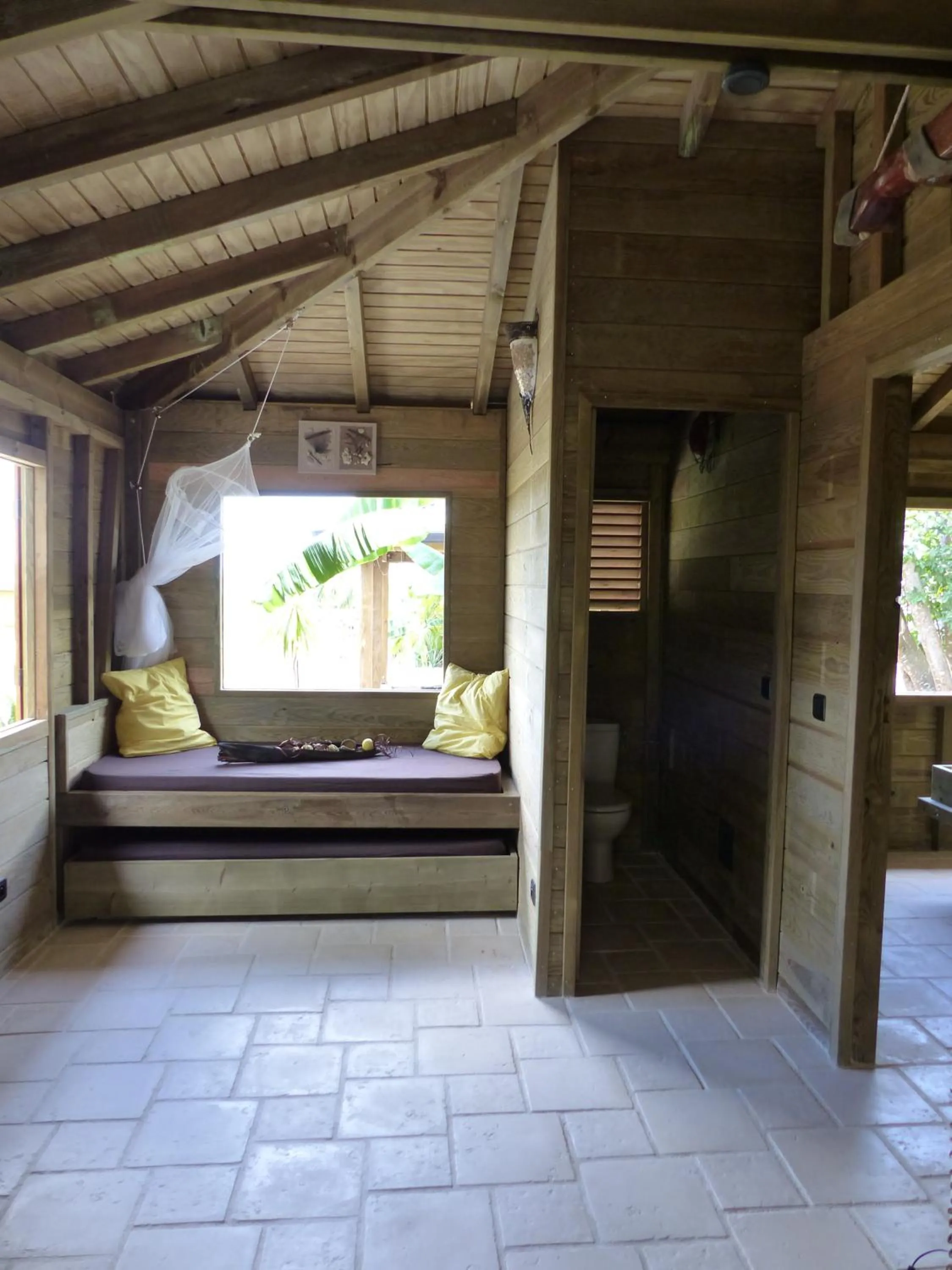 Bed in Iguana Ecolodge