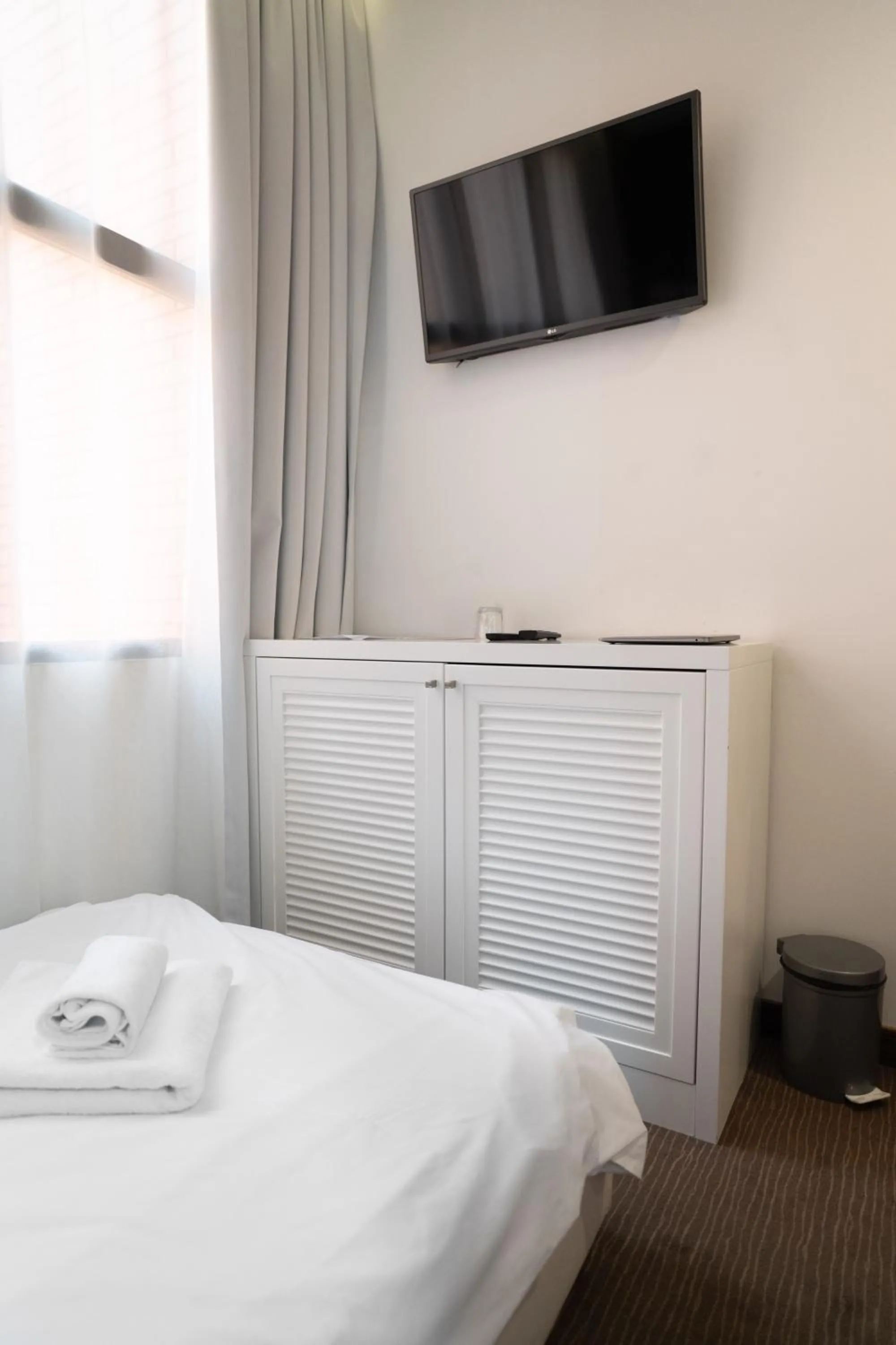 Bed in Hotel Passport