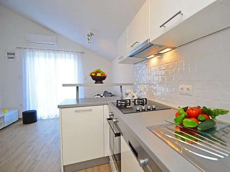 Kitchen or kitchenette in Apartmani Luka & Iva