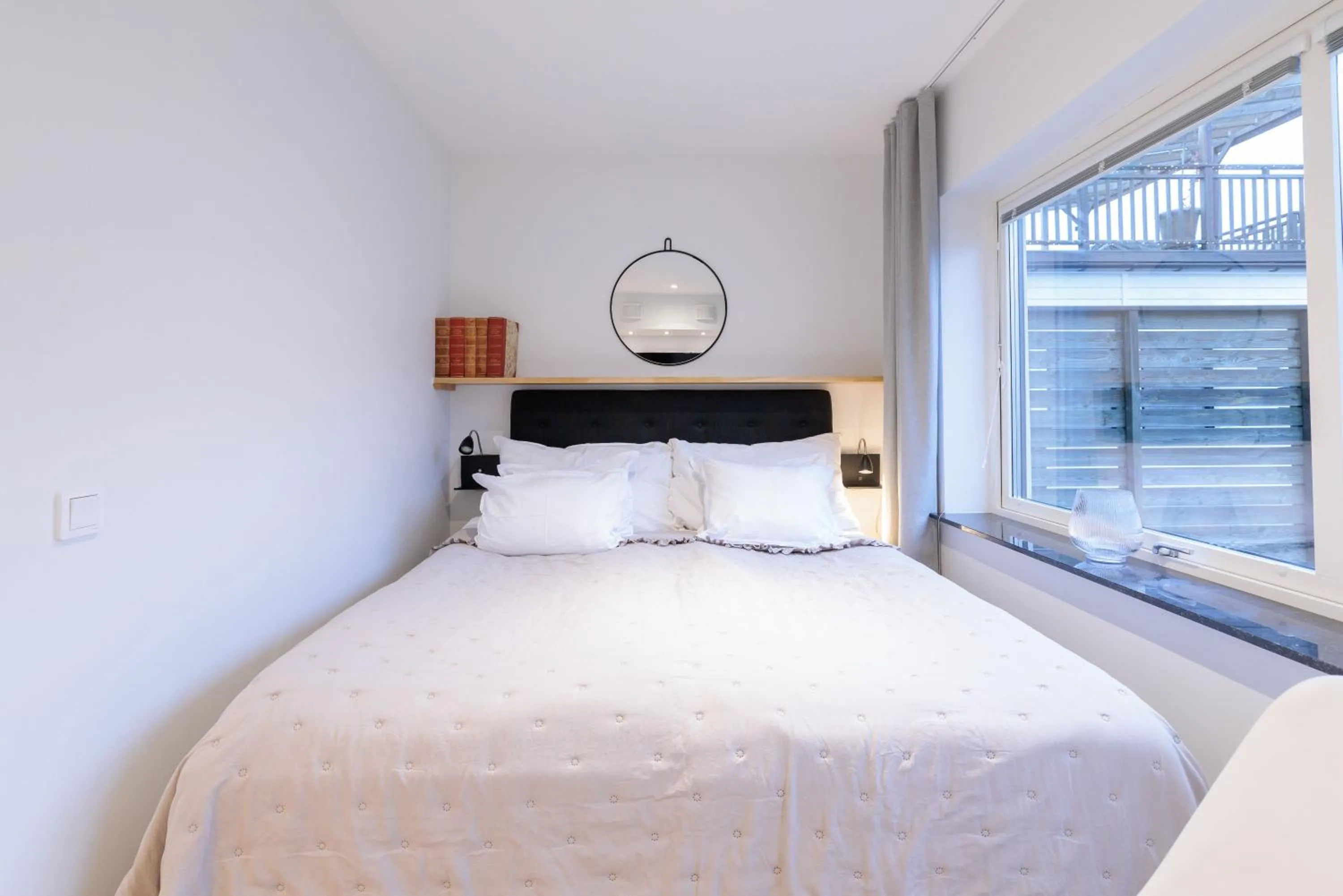 Bed in Easy Livin' Apartment Hotel