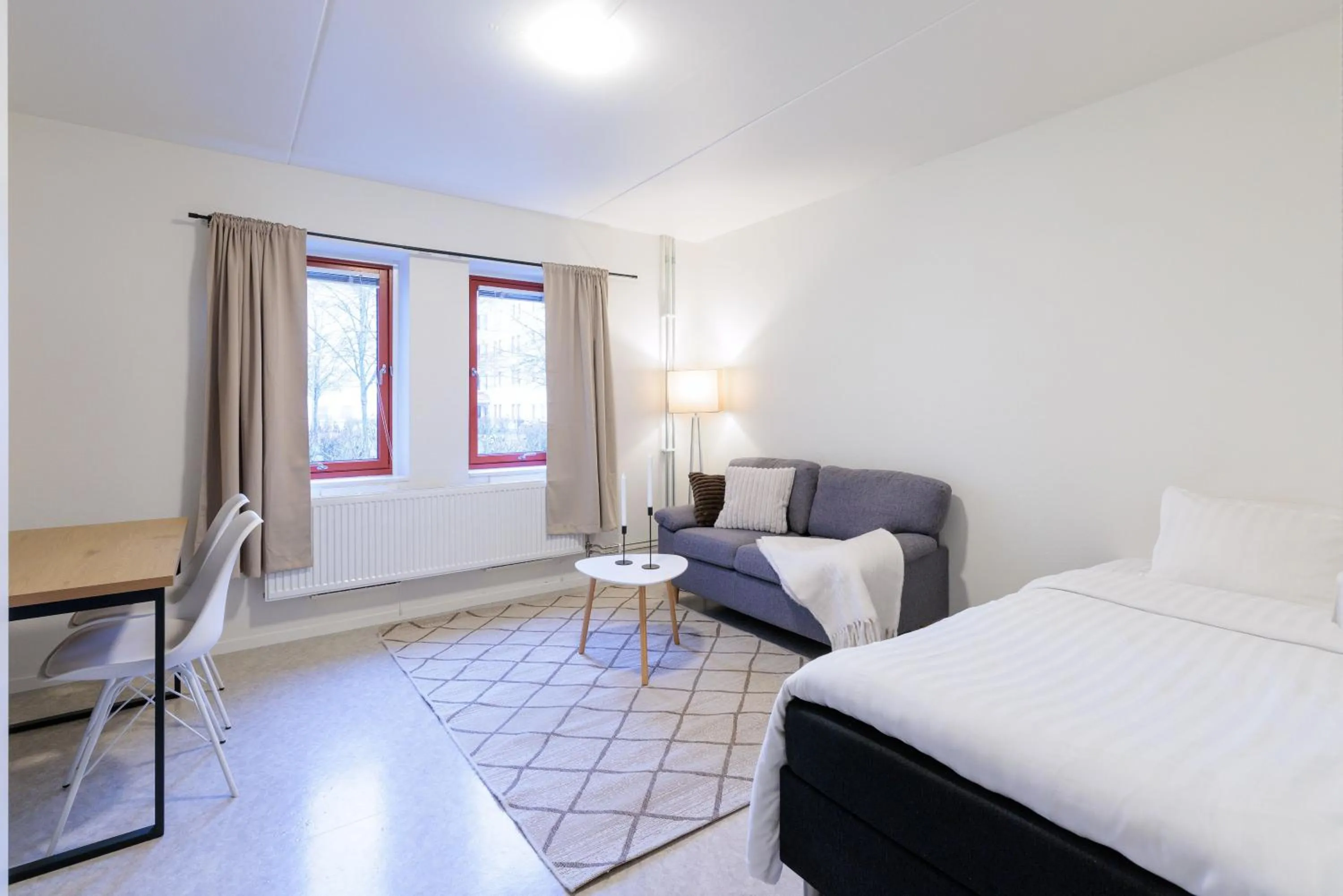 Bed in Easy Livin' Apartment Hotel