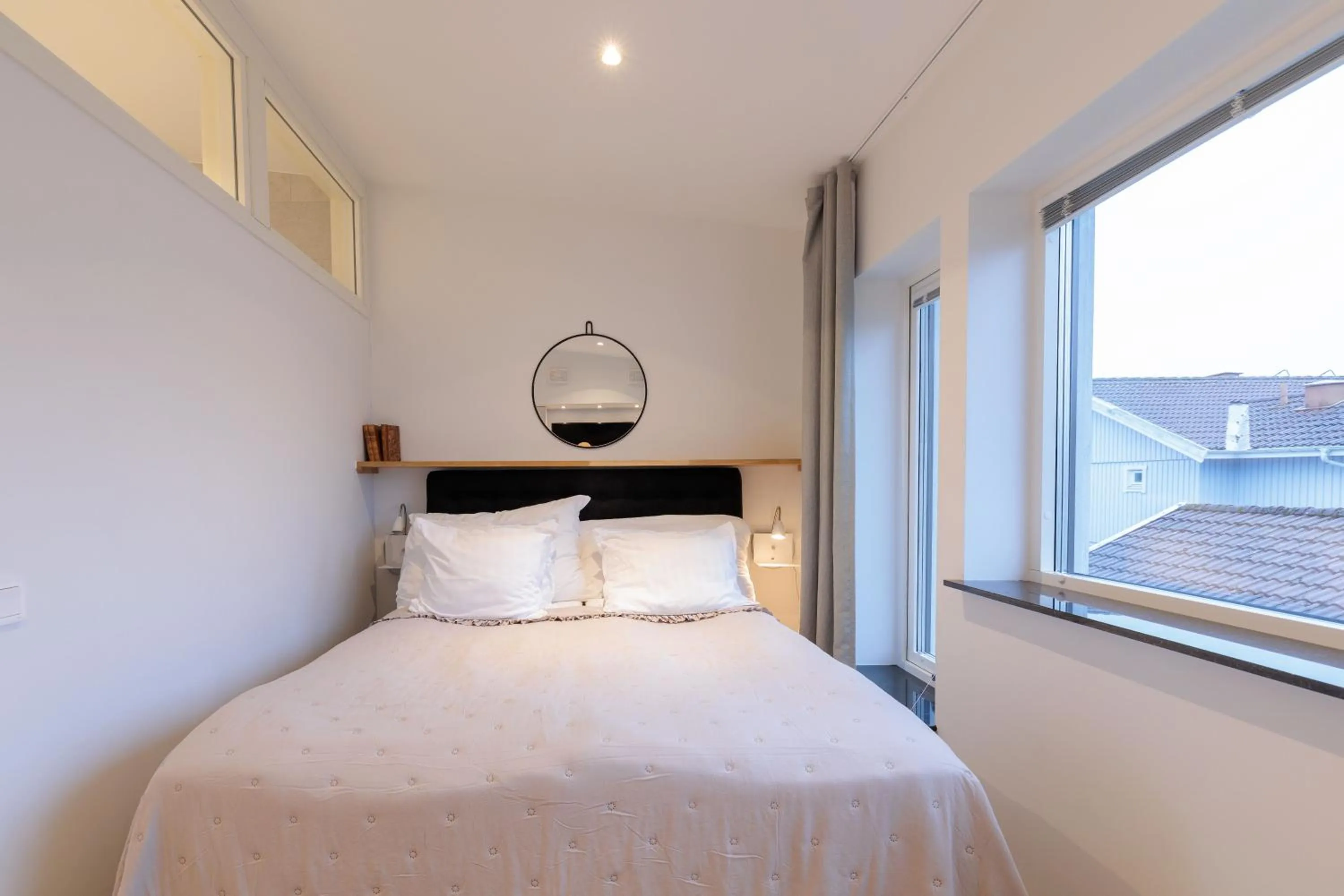 Bed in Easy Livin' Apartment Hotel