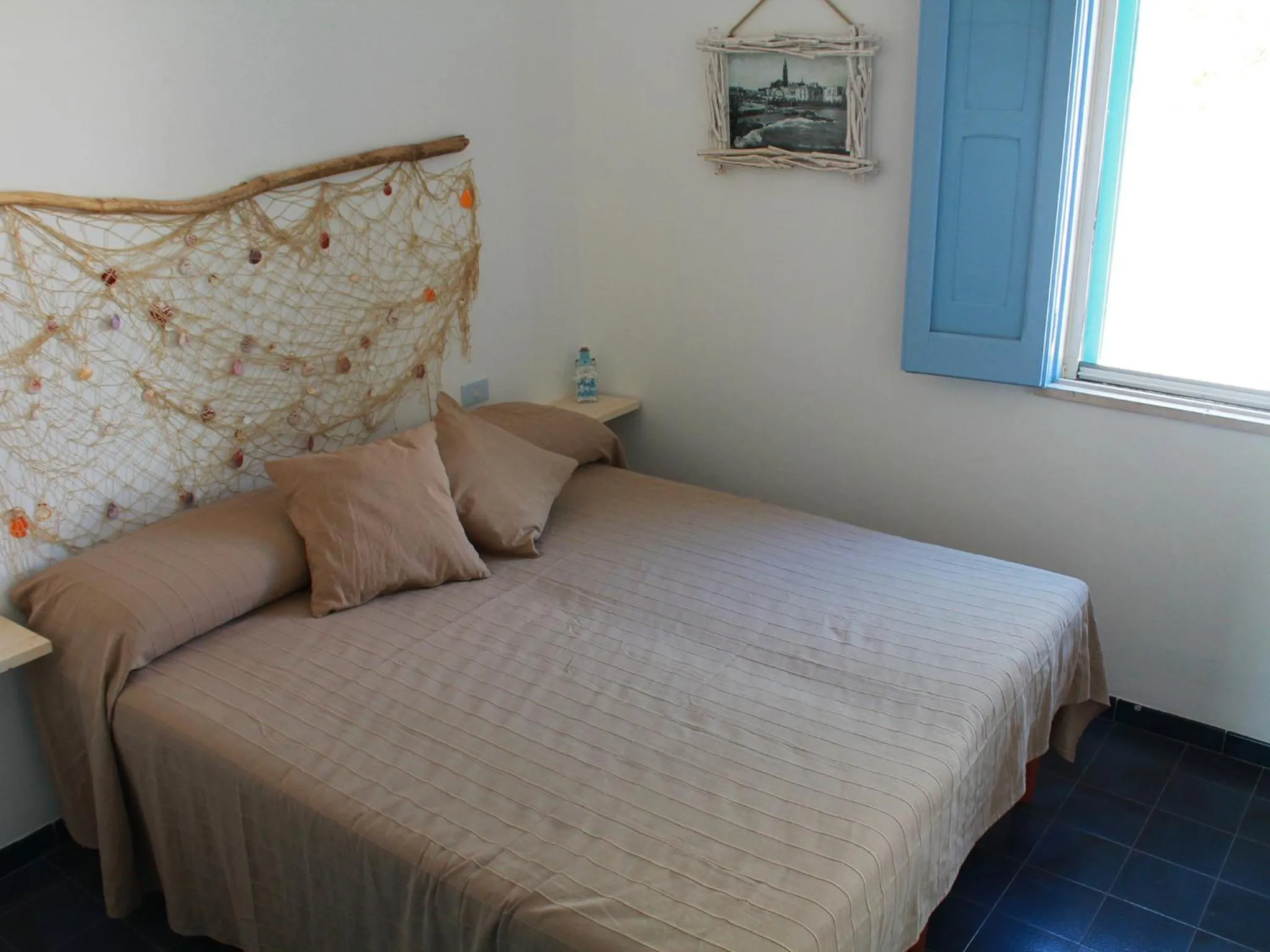 Bed in Villa Perla di Mare