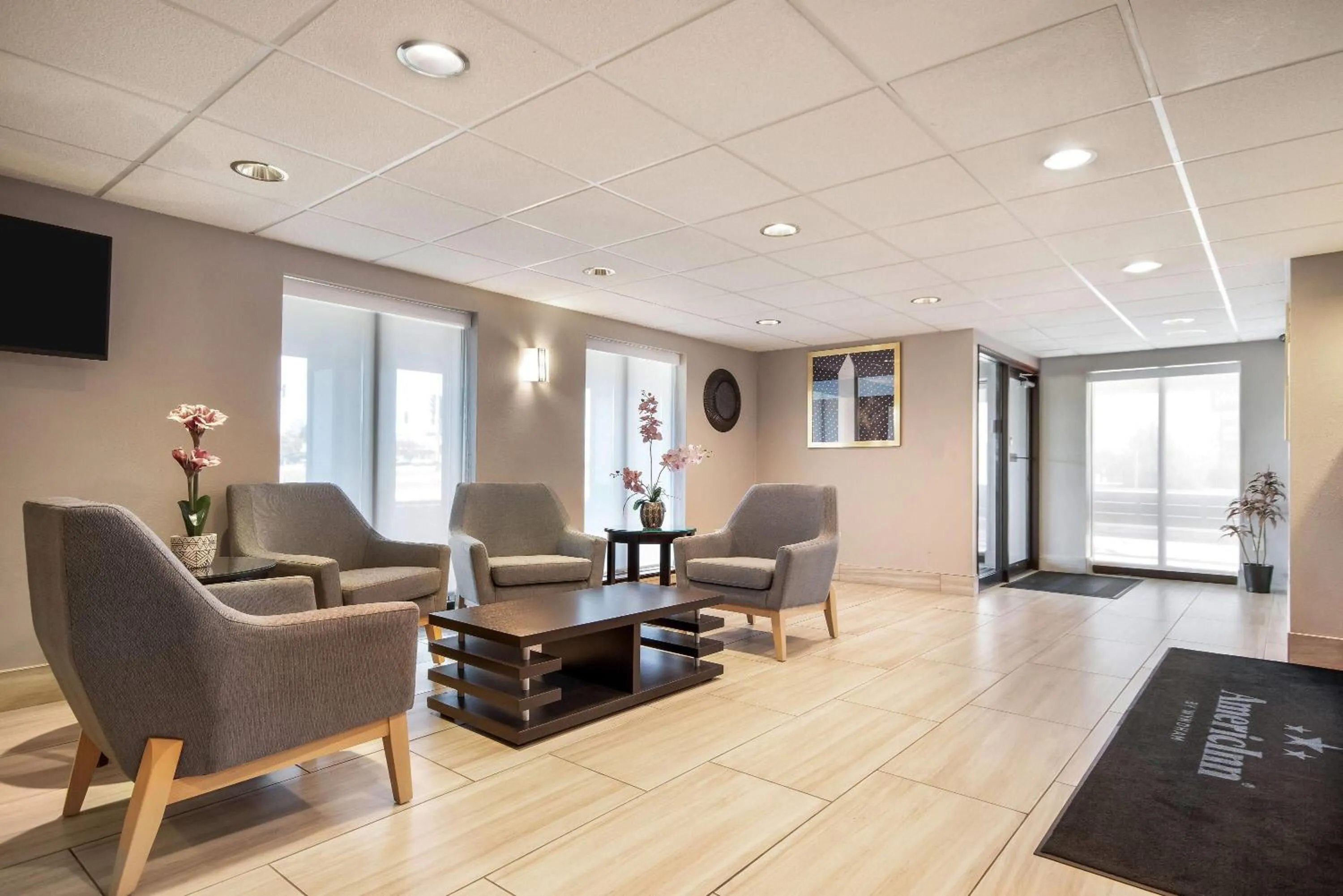 Lobby or reception in AmericInn by Wyndham Beloit