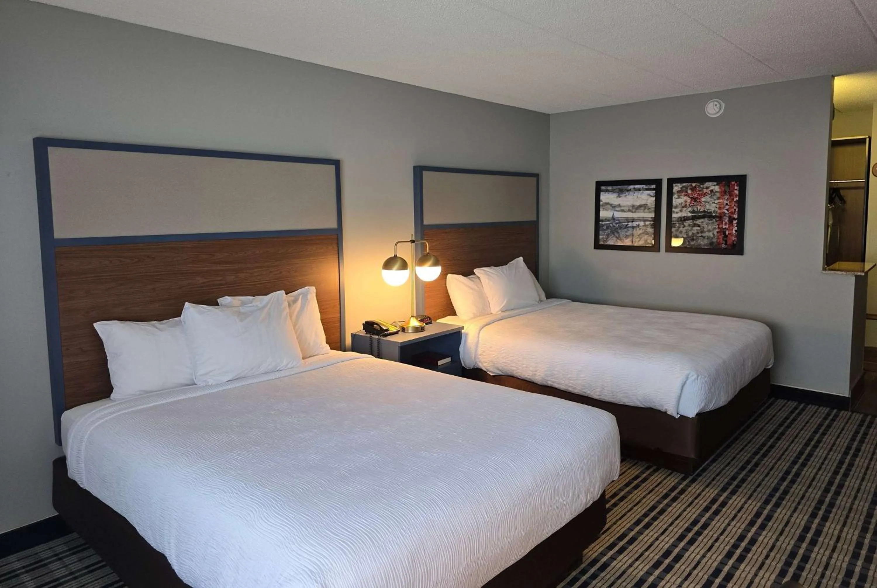 Photo of the whole room, Bed in AmericInn by Wyndham Beloit