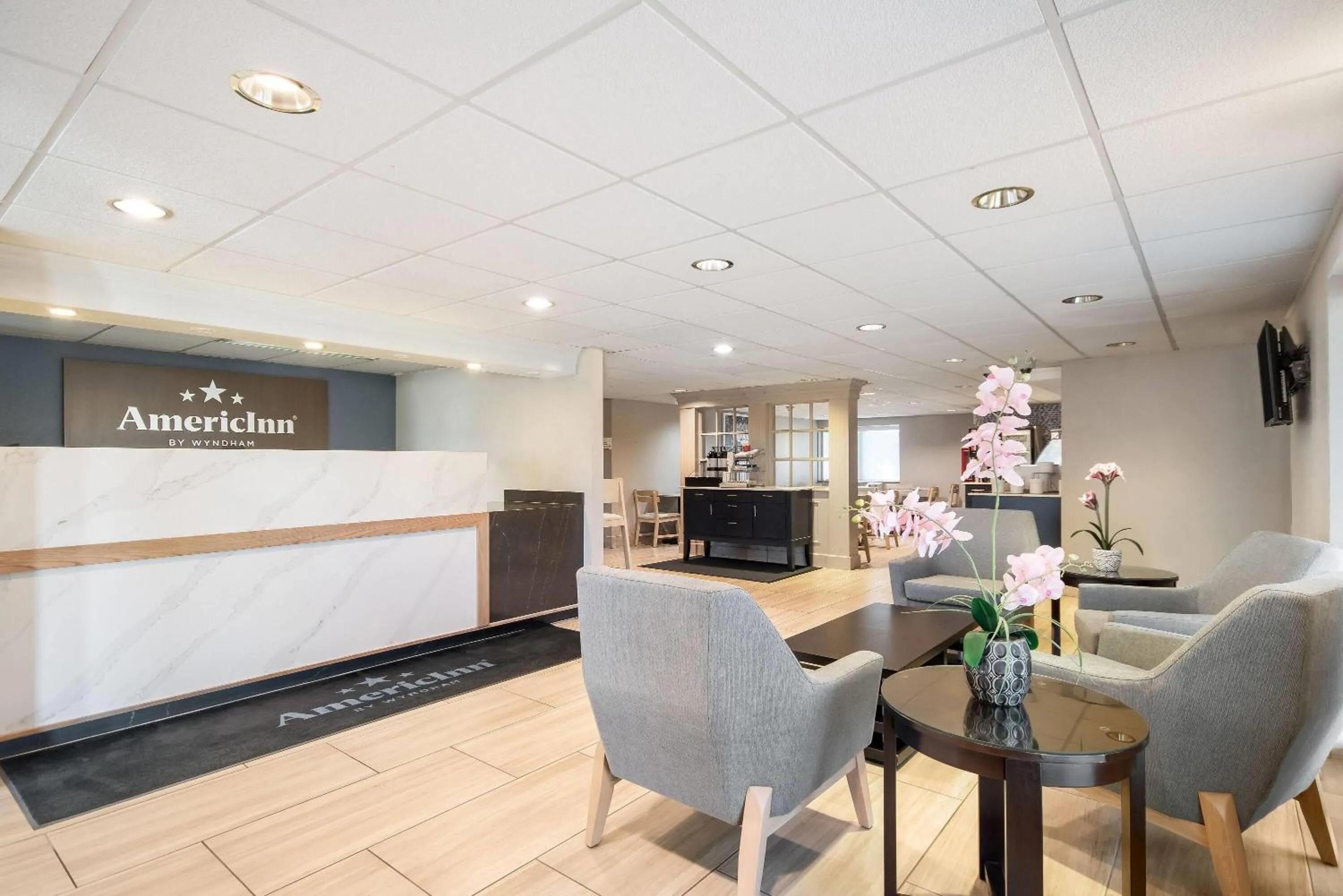 Lobby or reception in AmericInn by Wyndham Beloit