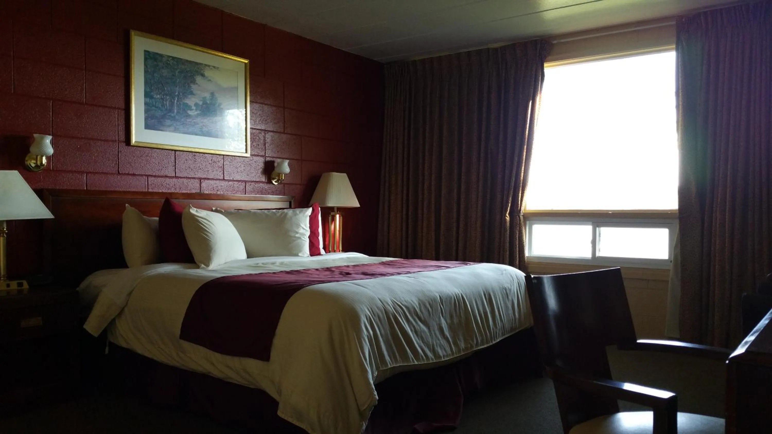 Bed in Riverview Motel