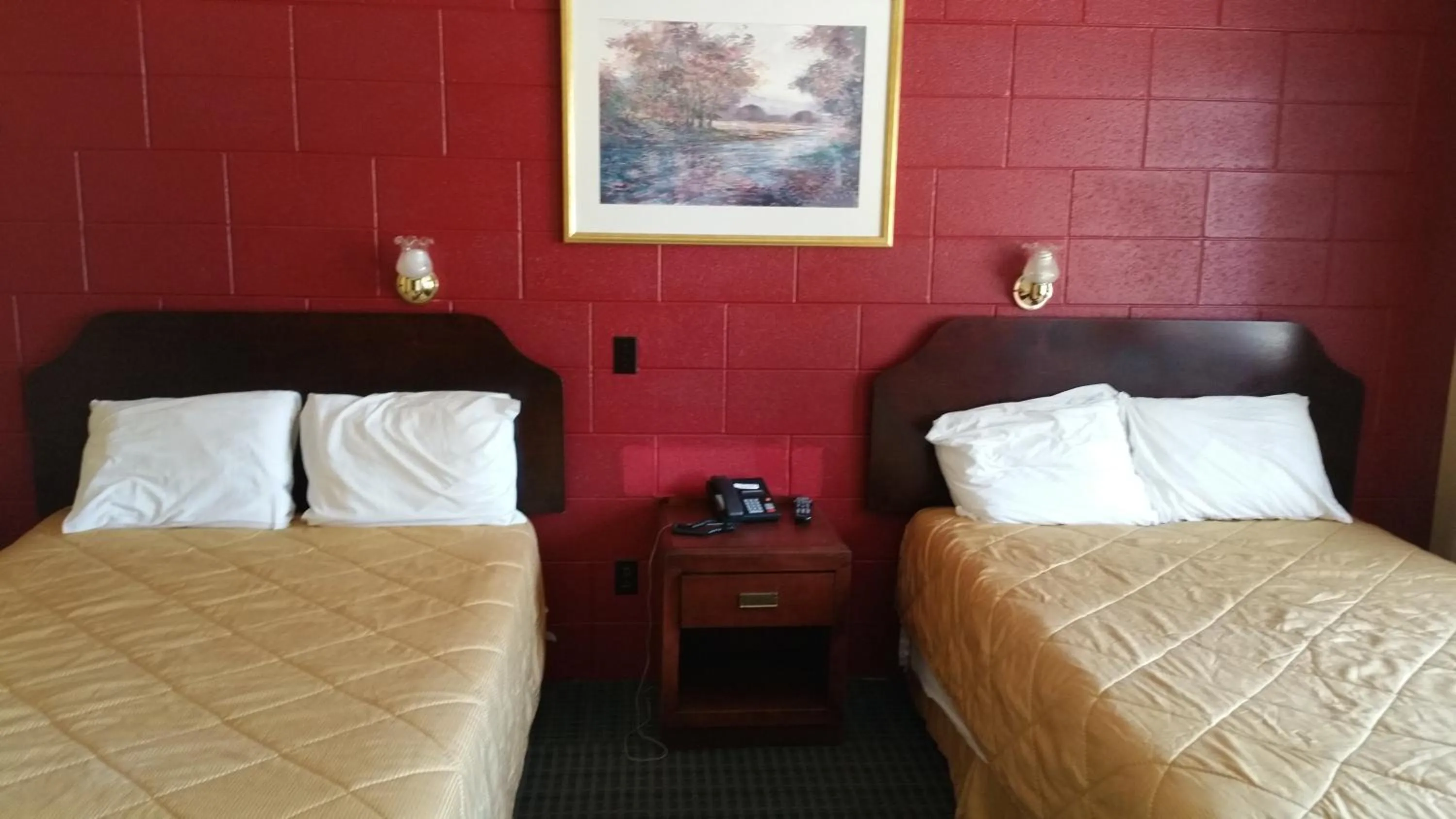 Bed in Riverview Motel