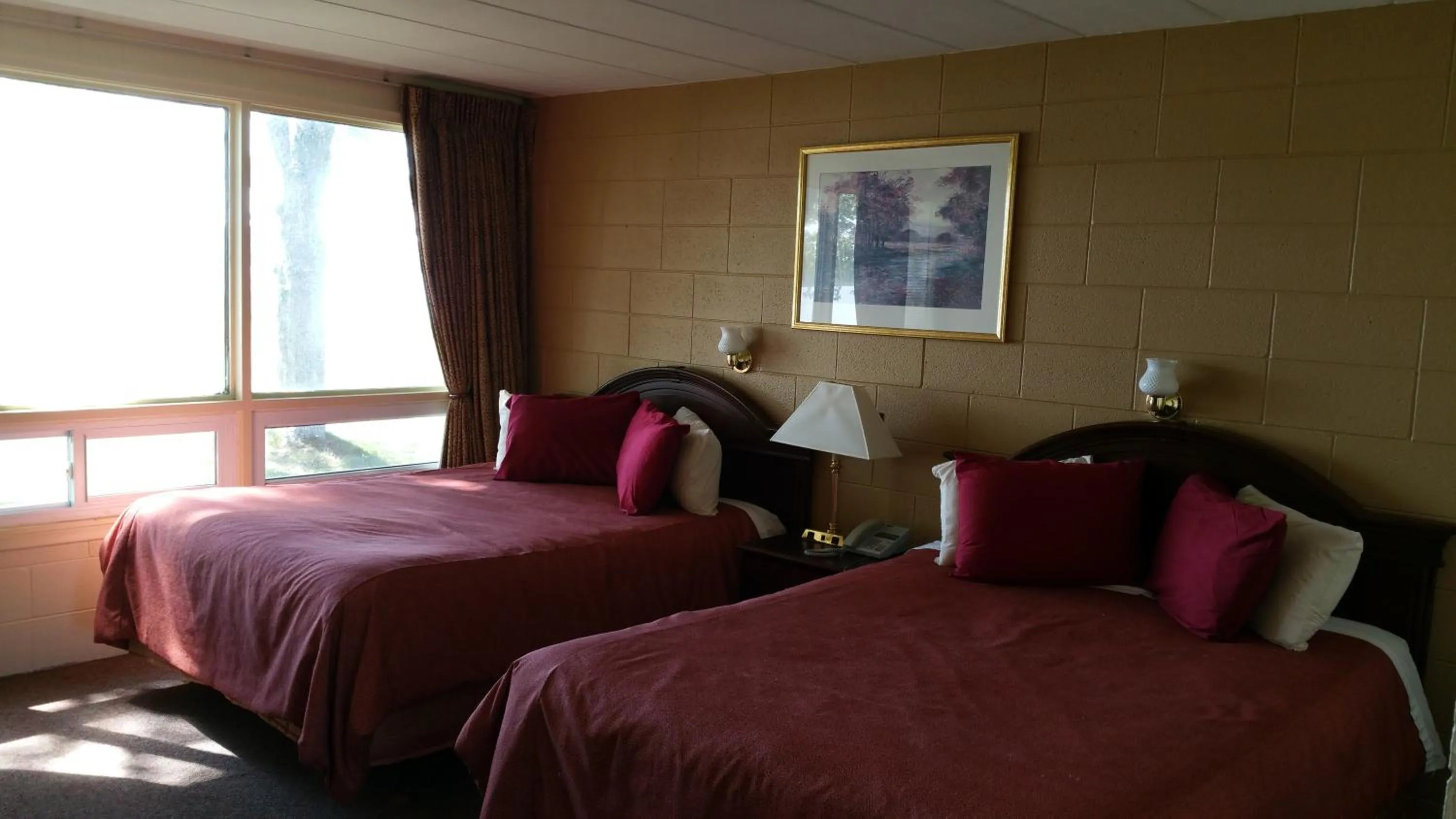 Bed in Riverview Motel