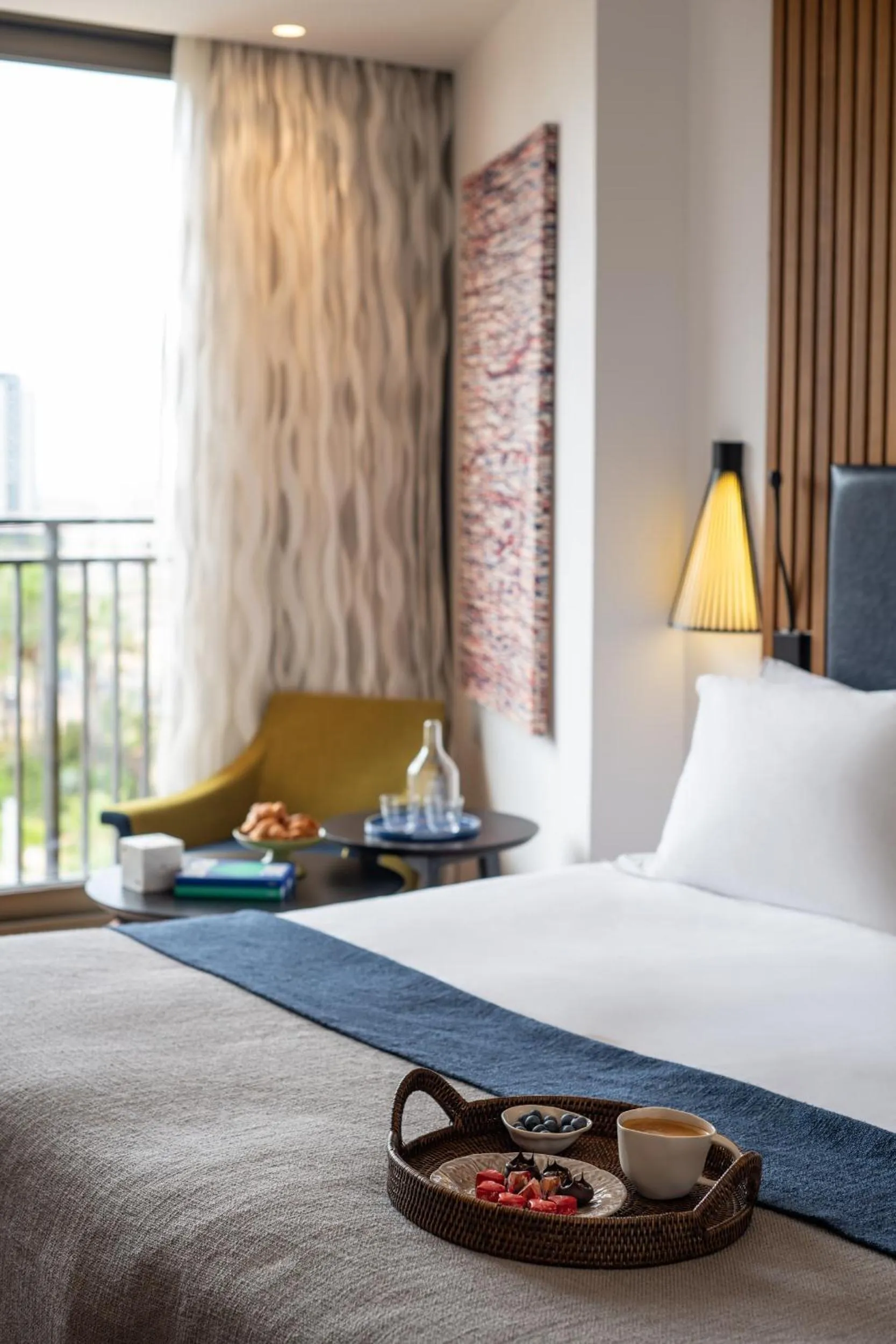 Bed in Dan Accadia Herzliya Hotel