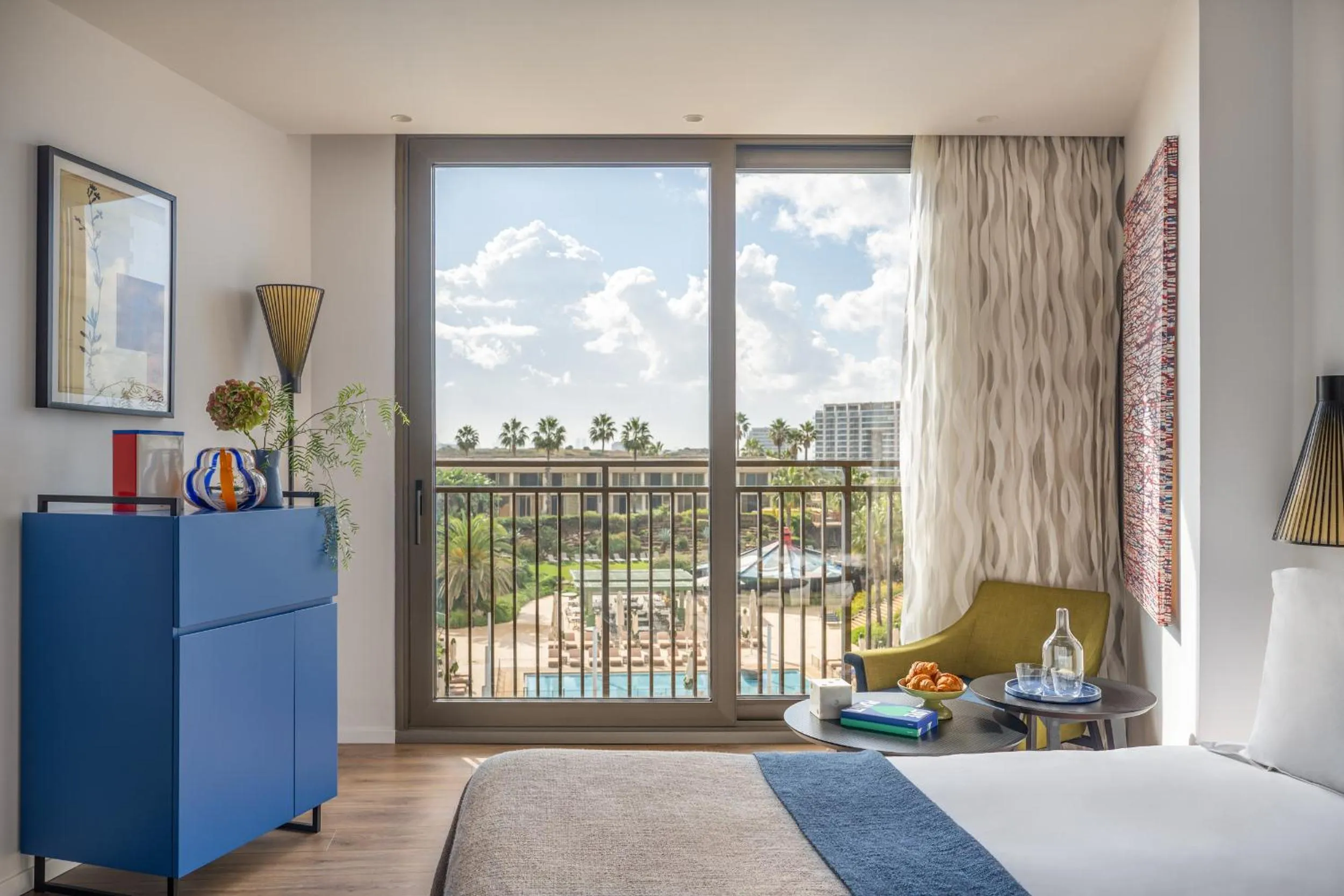 Bed in Dan Accadia Herzliya Hotel