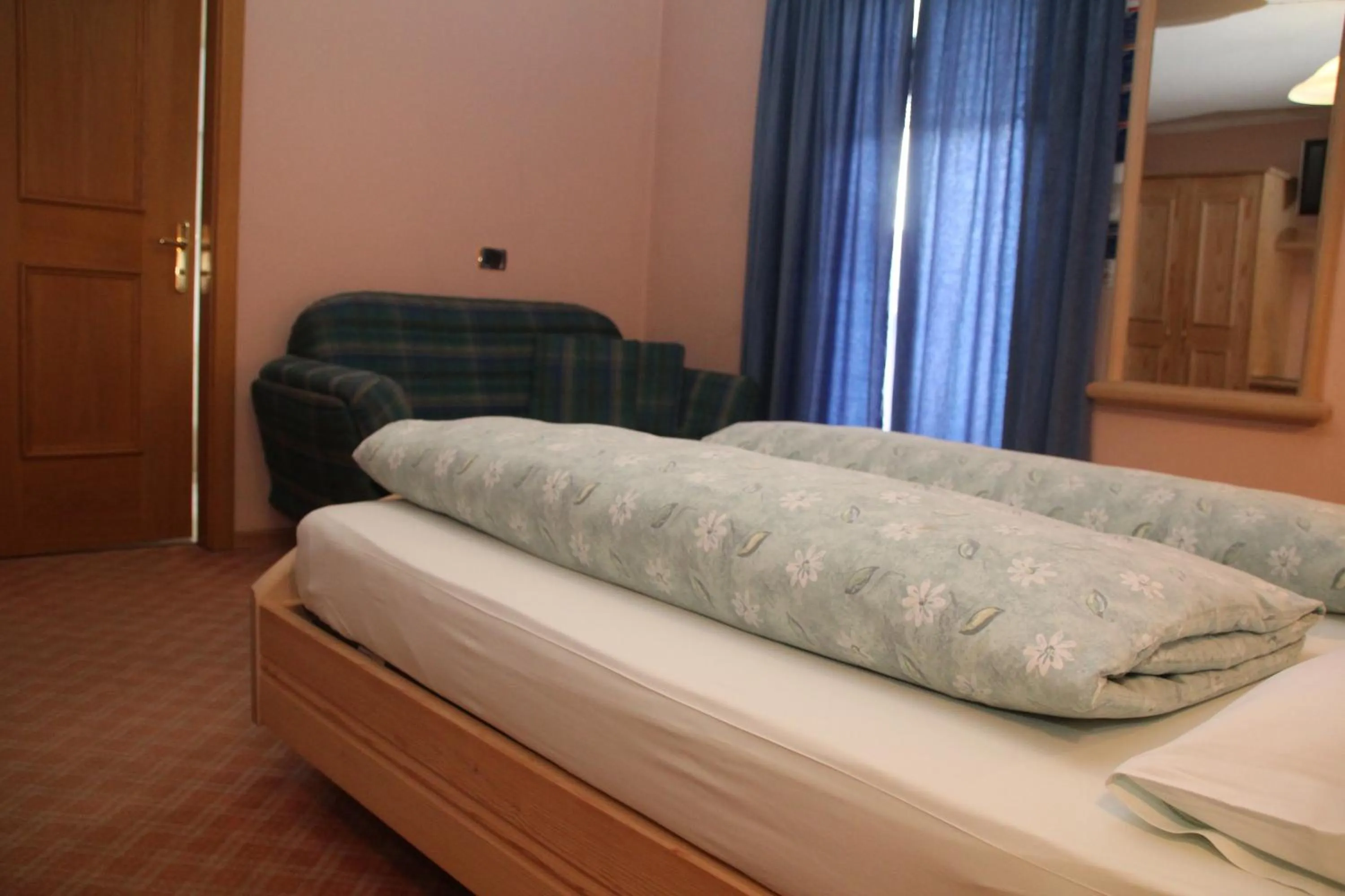Bed in Albergo Caravasc
