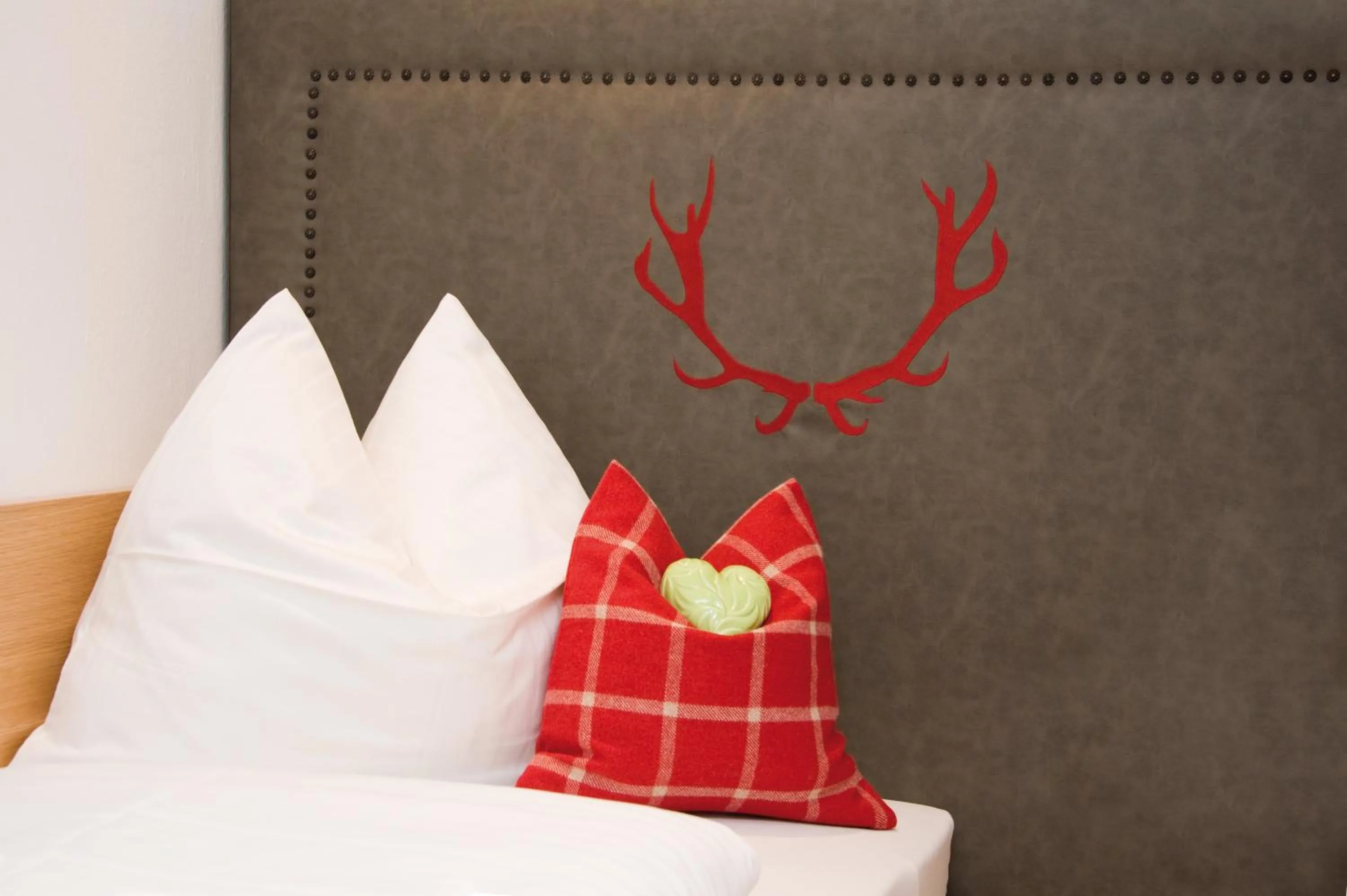 Decorative detail, Bed in Hotel Garni Rauch