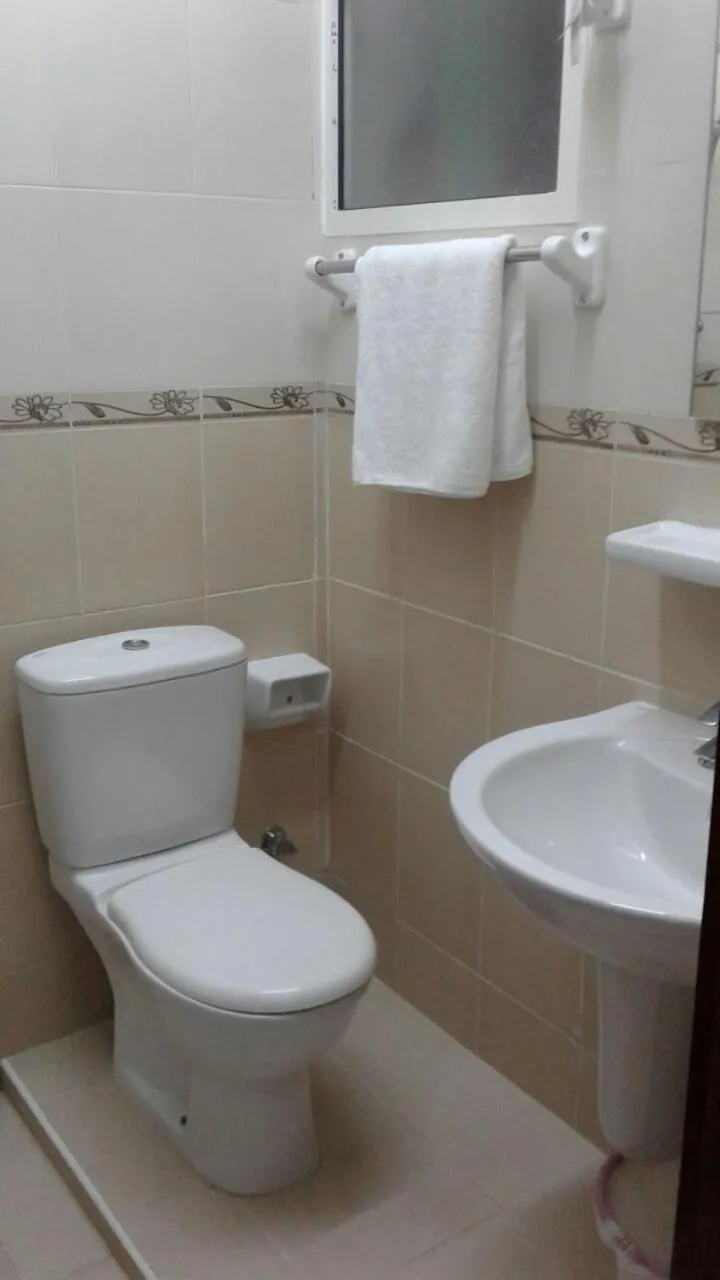 Toilet in Jawharet Al Kheir Furnished Apartments