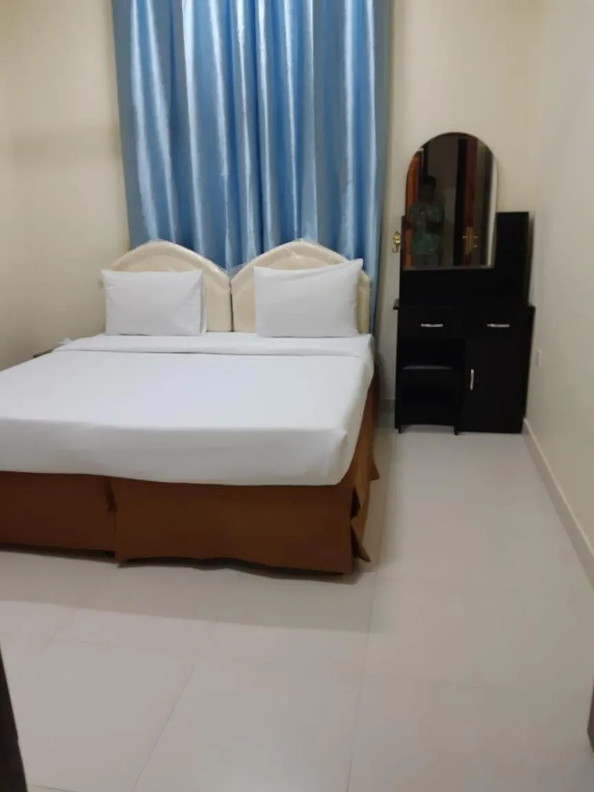 Bed in Jawharet Al Kheir Furnished Apartments