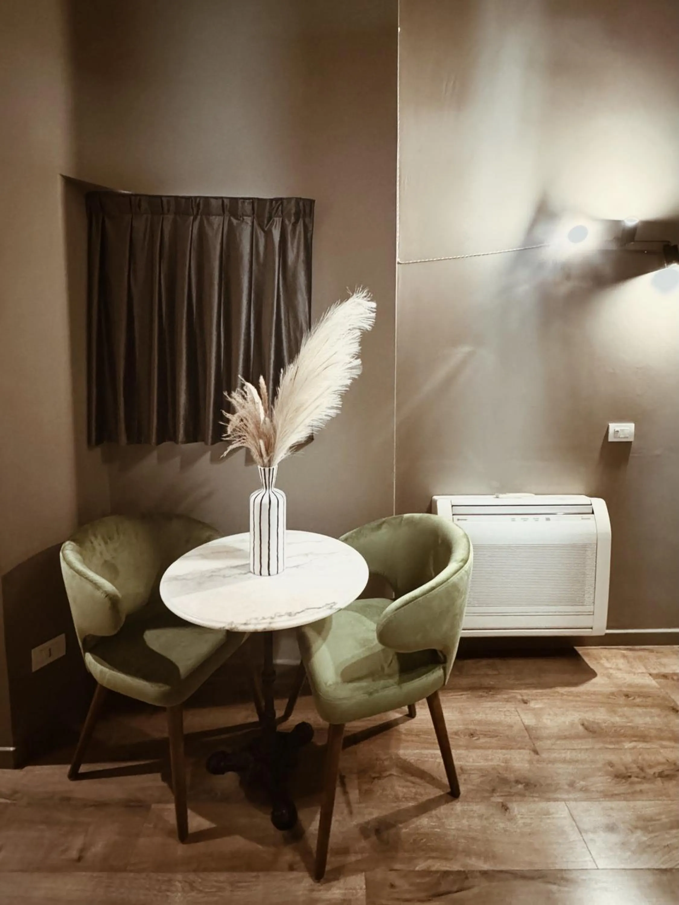 Seating area in Residenza Sciarra Suites