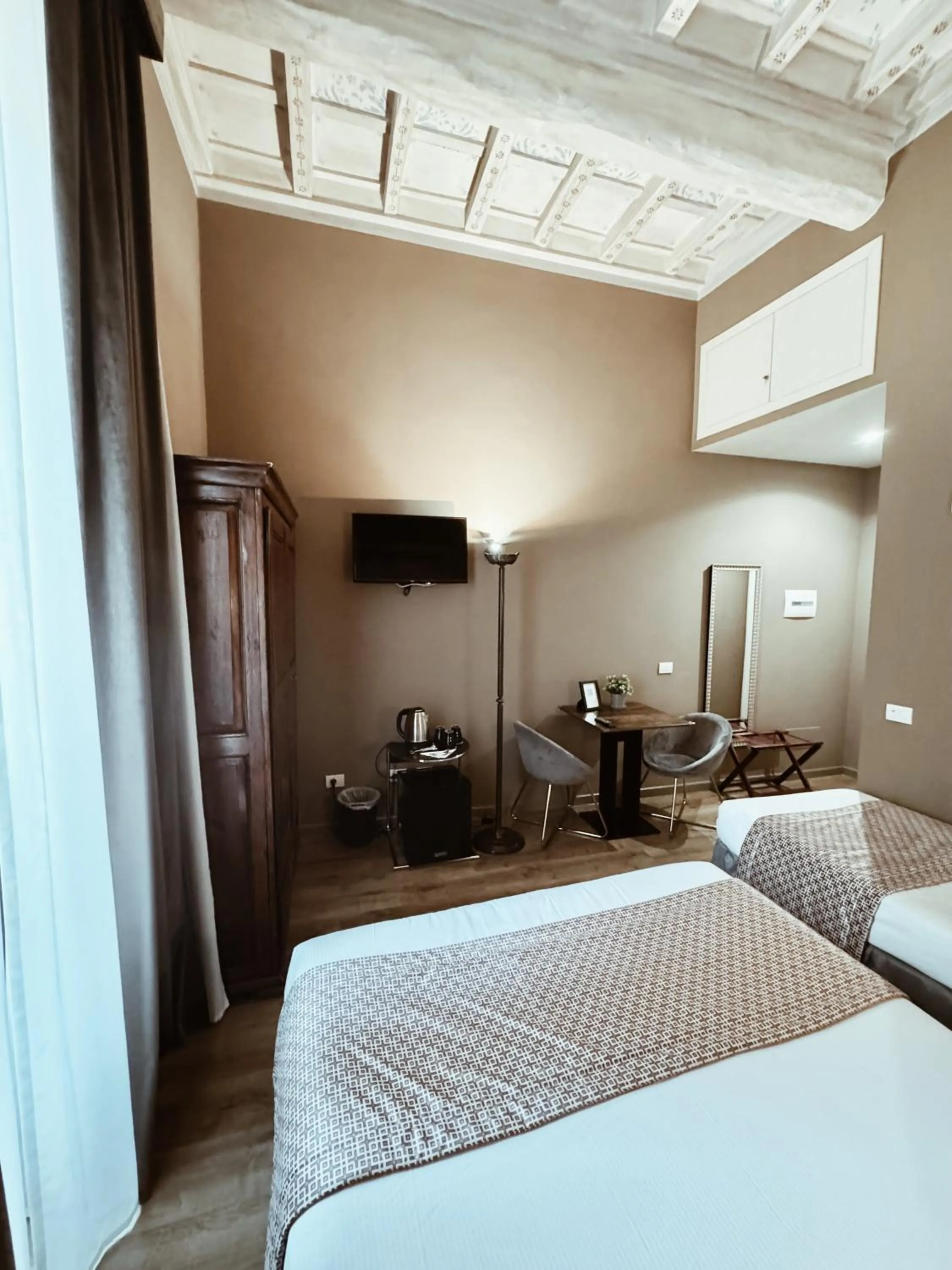 Bed in Residenza Sciarra Suites