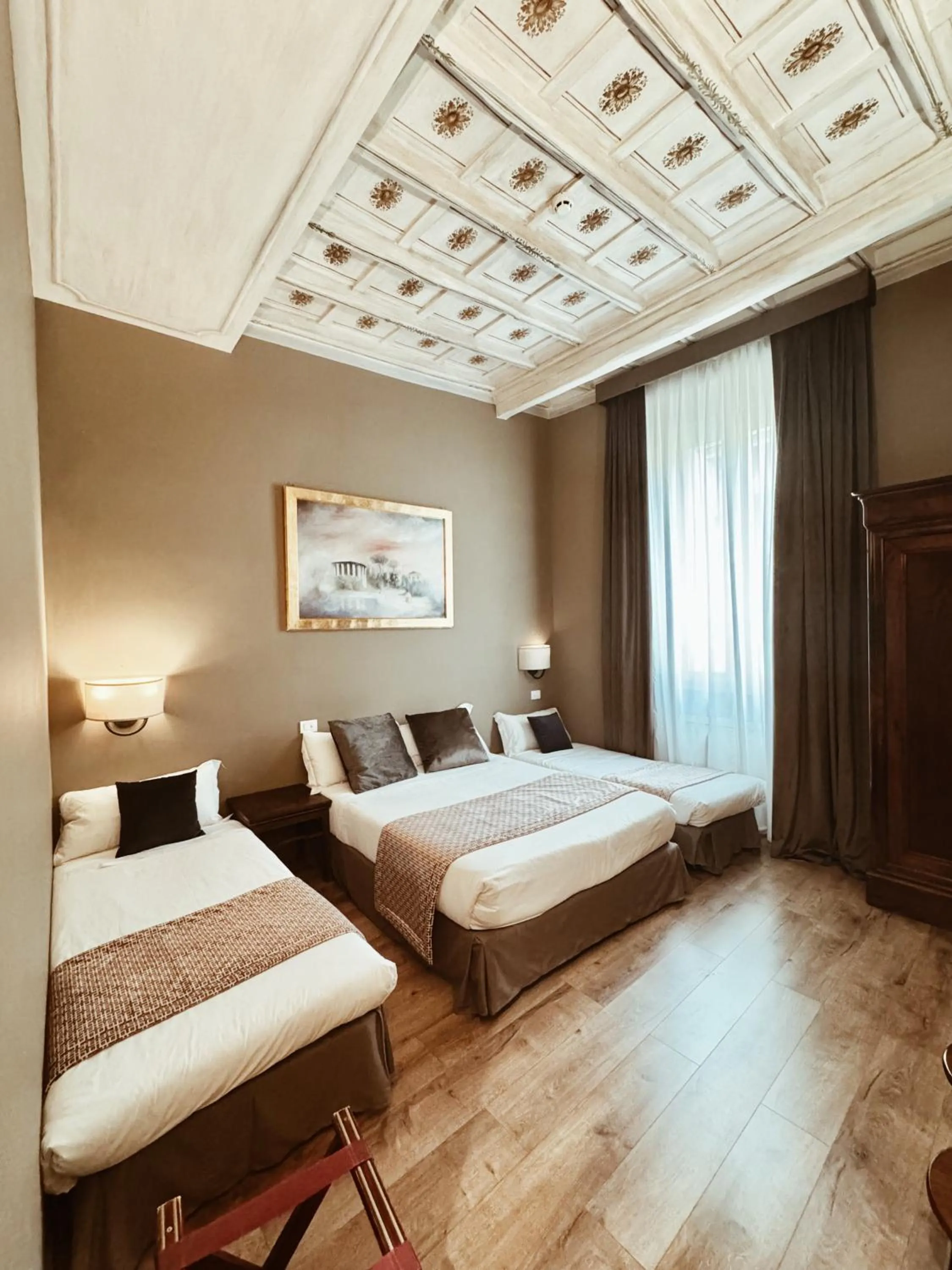 Bed in Residenza Sciarra Suites