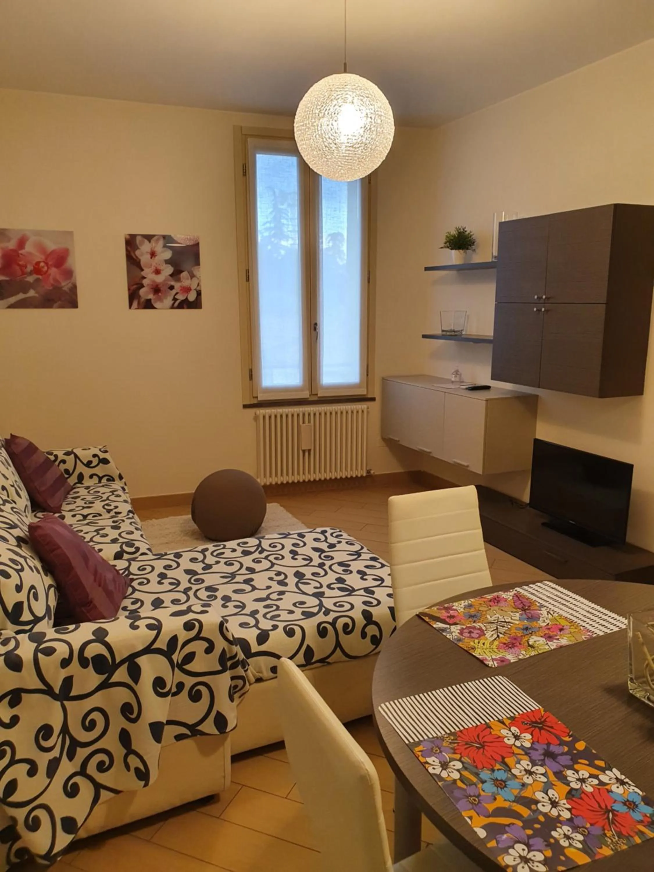 Living room, Bed in Residenza Venturini