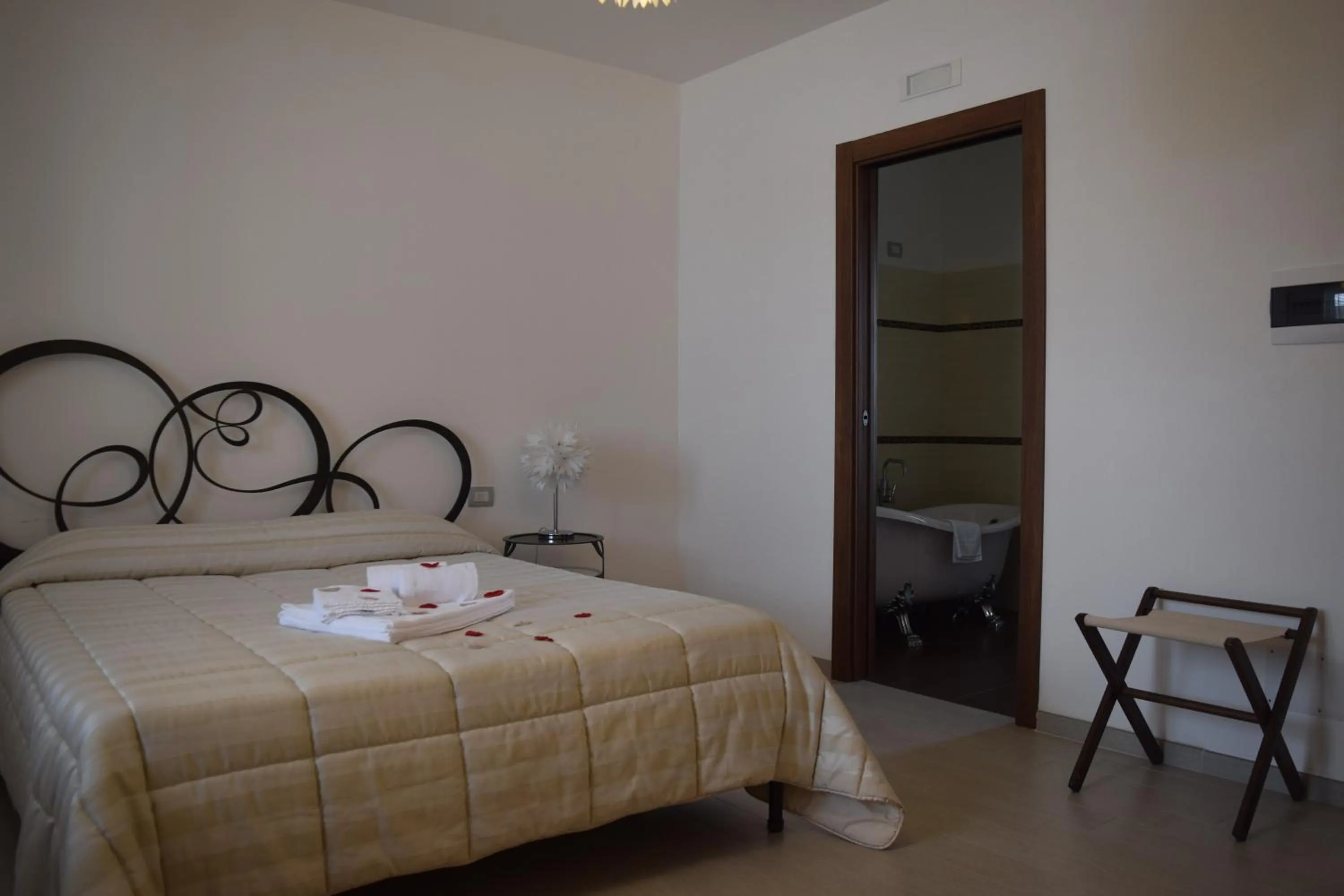 Photo of the whole room, Bed in Masseria Corte Masseriola