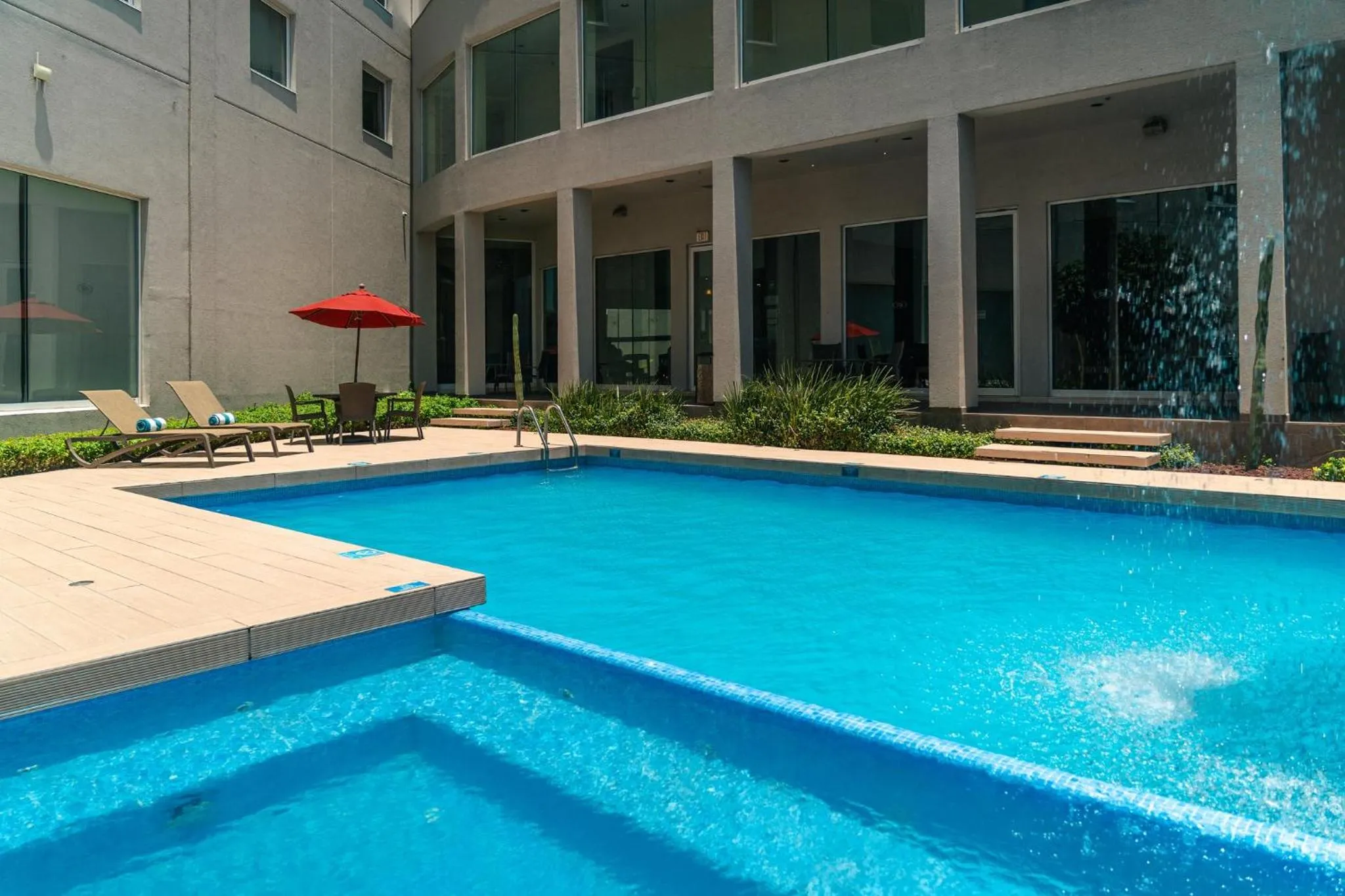 Swimming pool in Crowne Plaza Monterrey Aeropuerto by IHG
