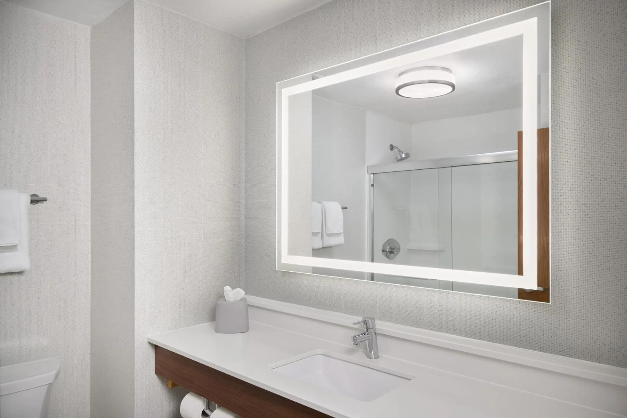 Bathroom in Holiday Inn Express Kansas City - at the Legends! by IHG