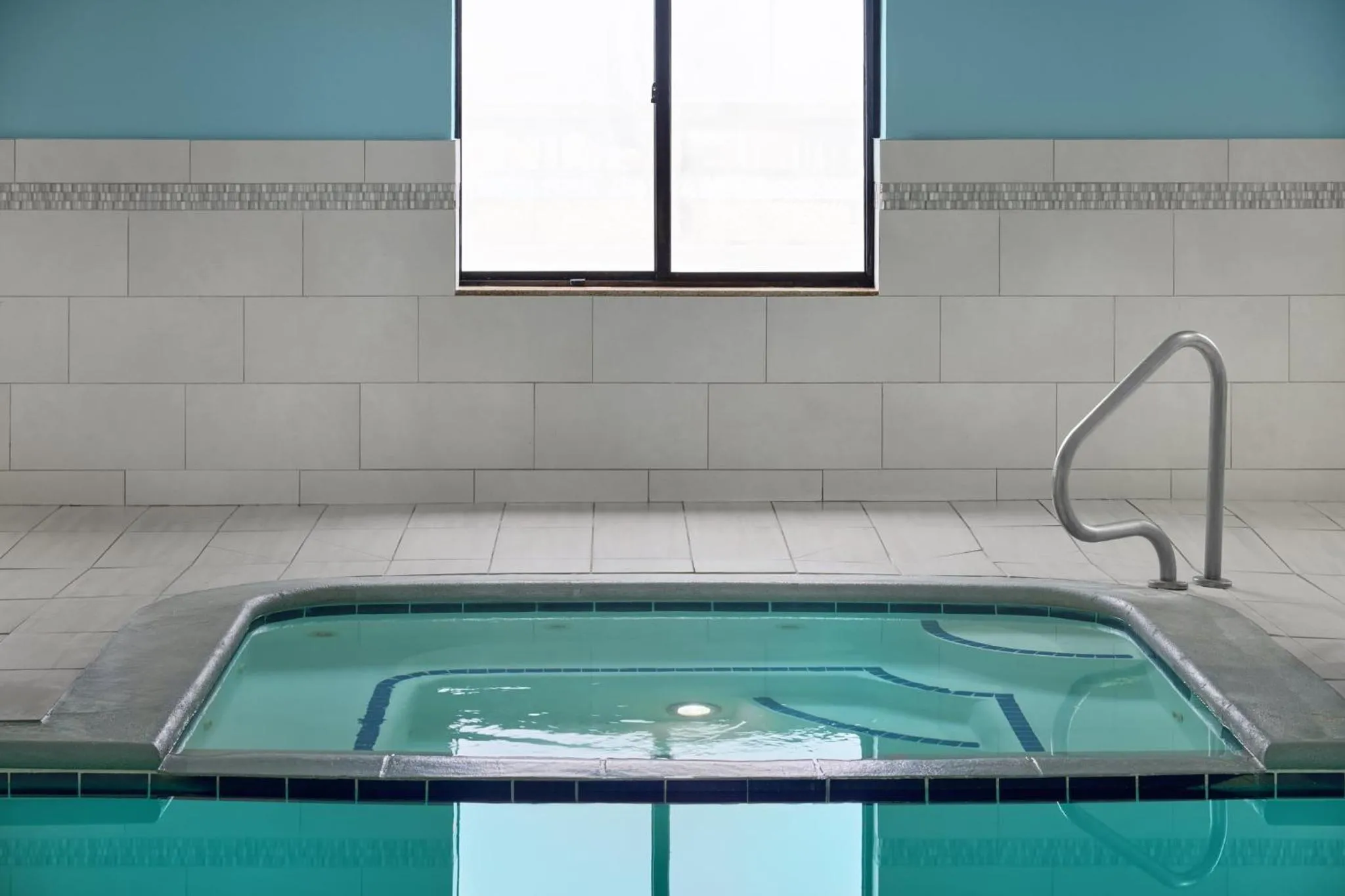 Swimming pool in Holiday Inn Express Kansas City - at the Legends! by IHG