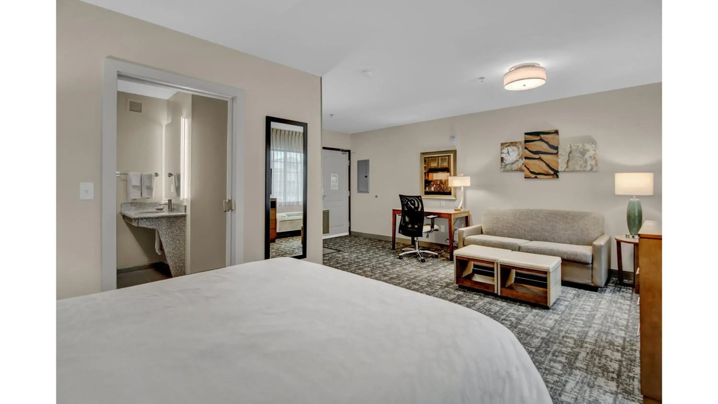 Photo of the whole room, Bed in Staybridge Suites Salt Lake-West Valley City by IHG Photo of the whole room, Bed in Staybridge Suites Salt Lake-West Valley City by IHG