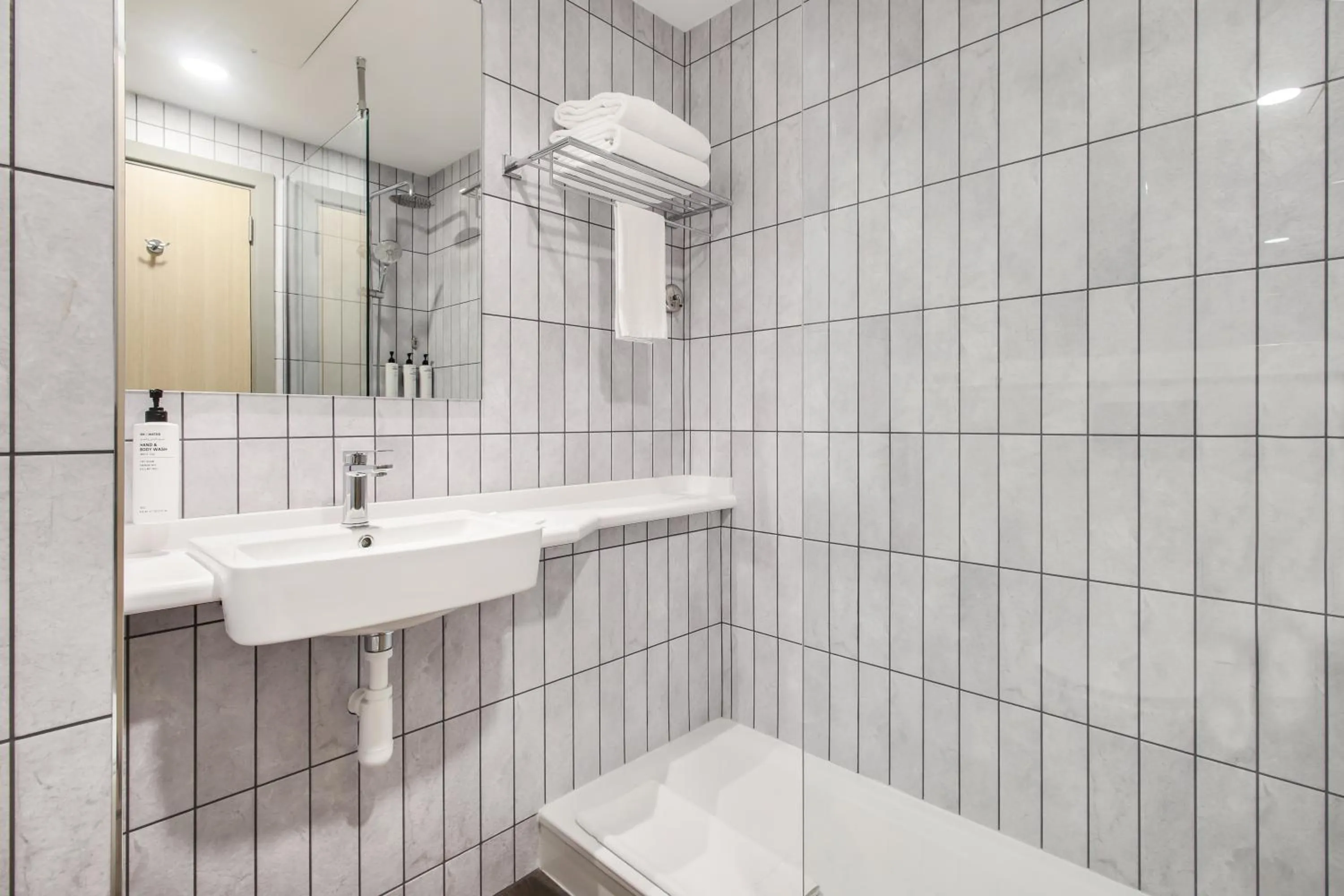 Shower in Premier Inn Dubai International Airport - An Emirates Group Company