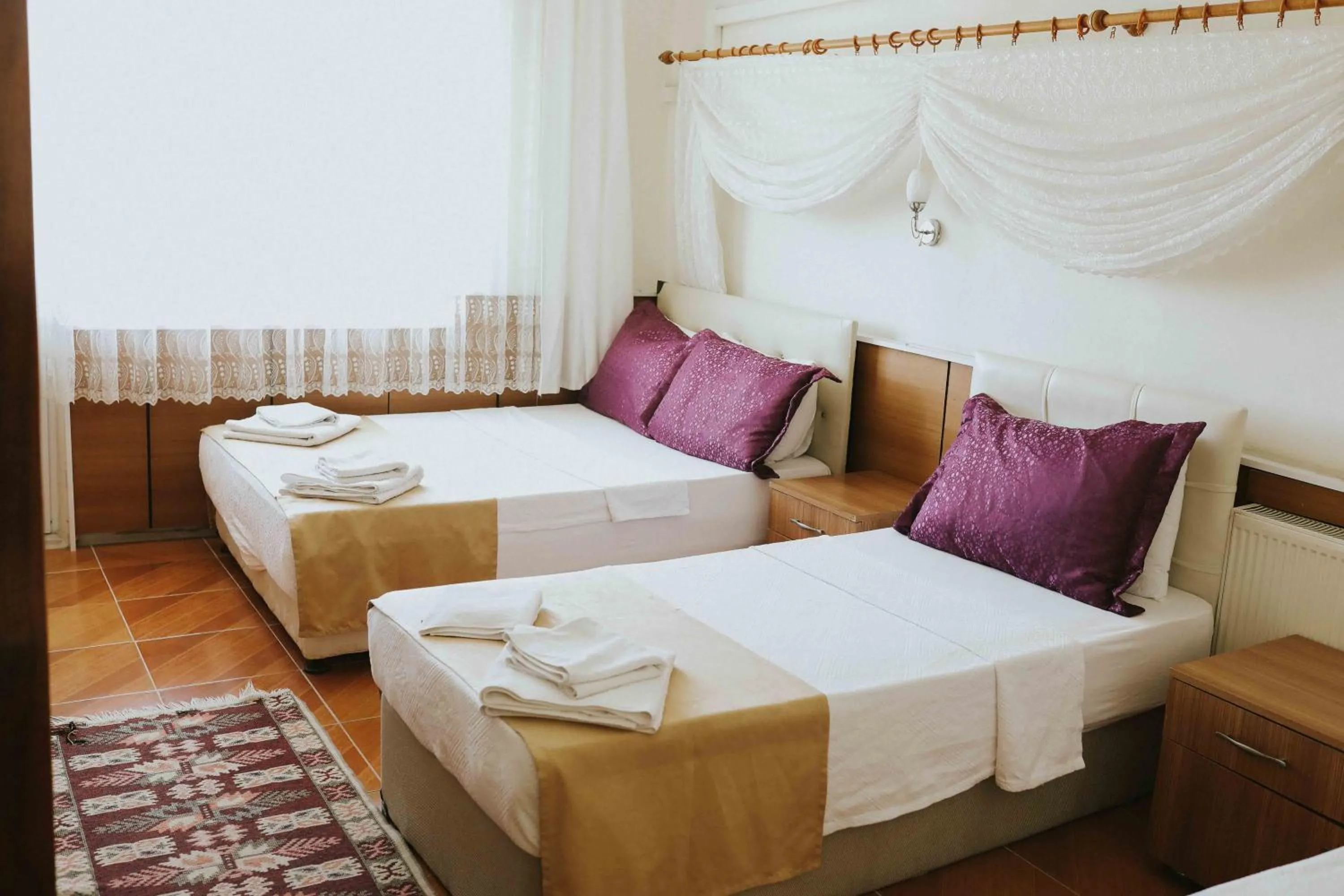 Bed in Kervansaray Hotel