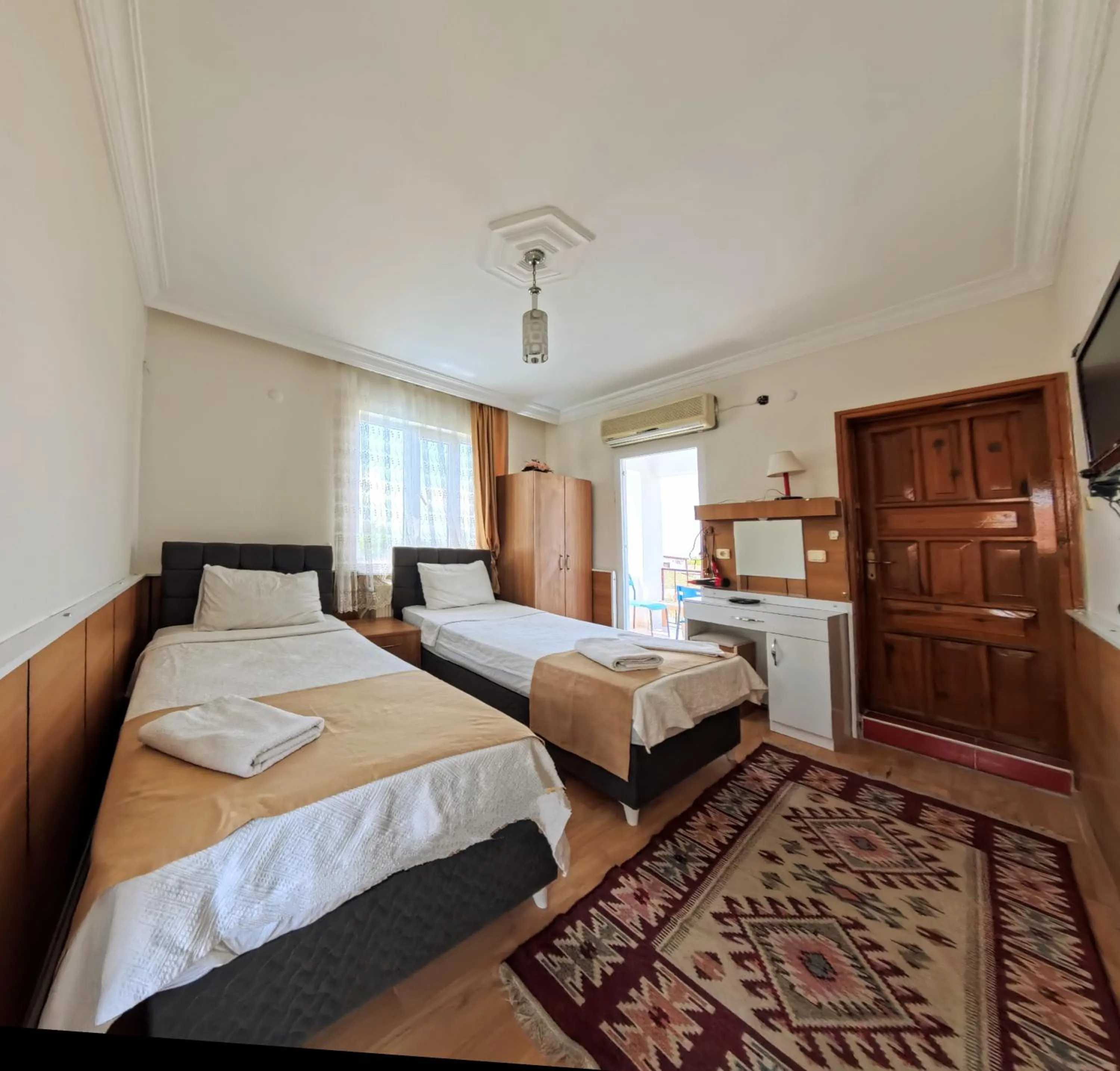 Bed in Kervansaray Hotel