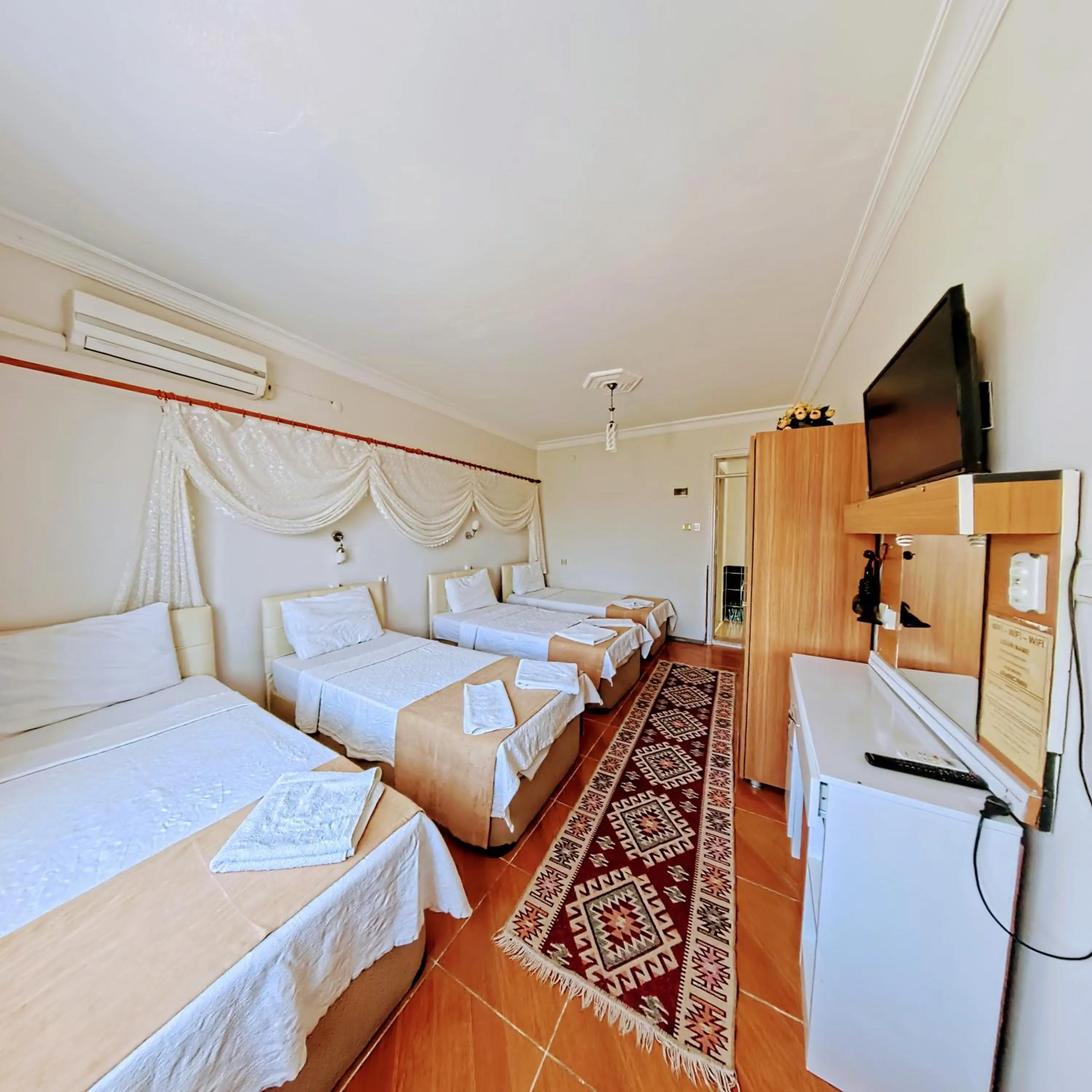 Bed in Kervansaray Hotel