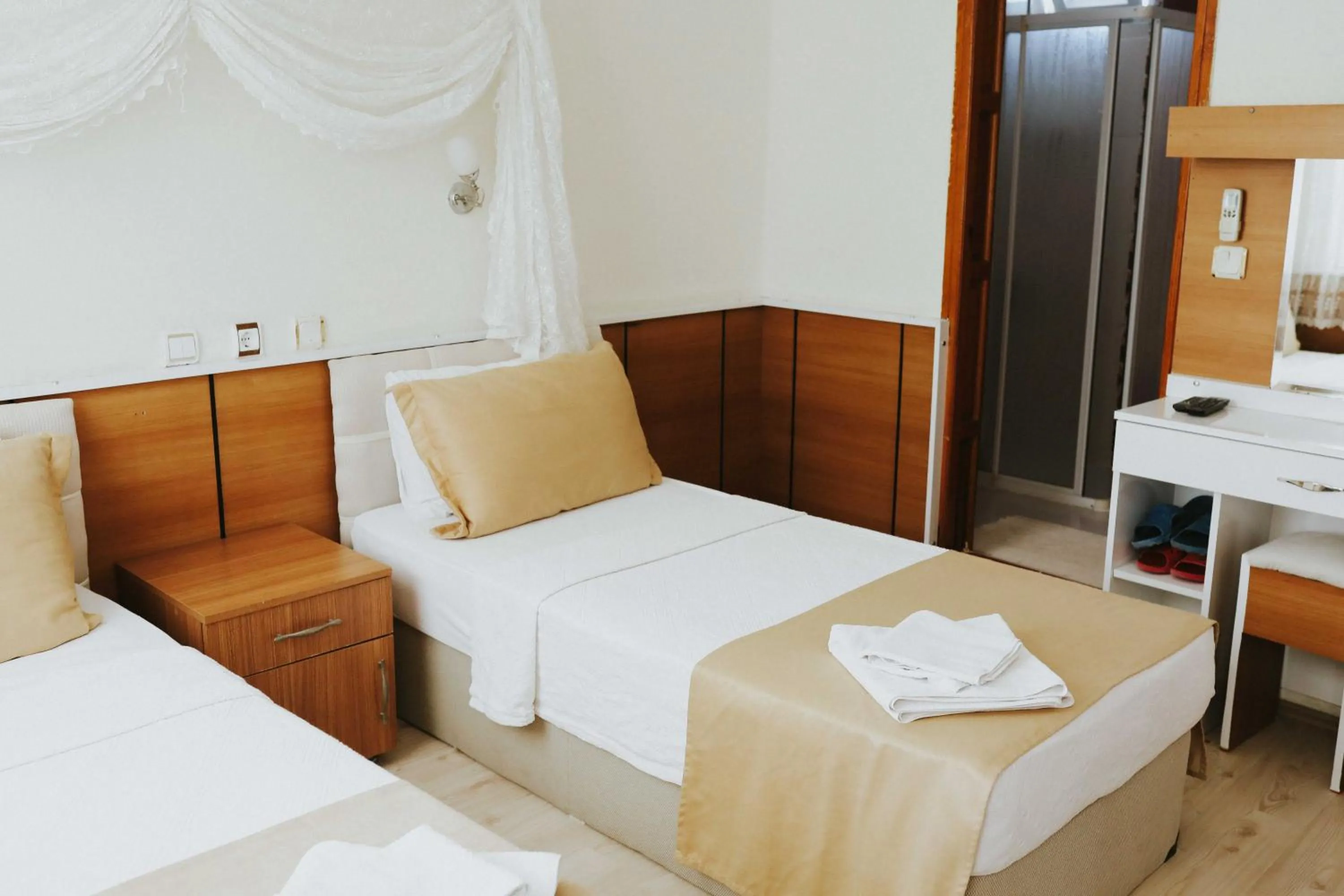 Bed in Kervansaray Hotel