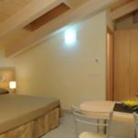 Photo of the whole room, Bed in Residence Belmare