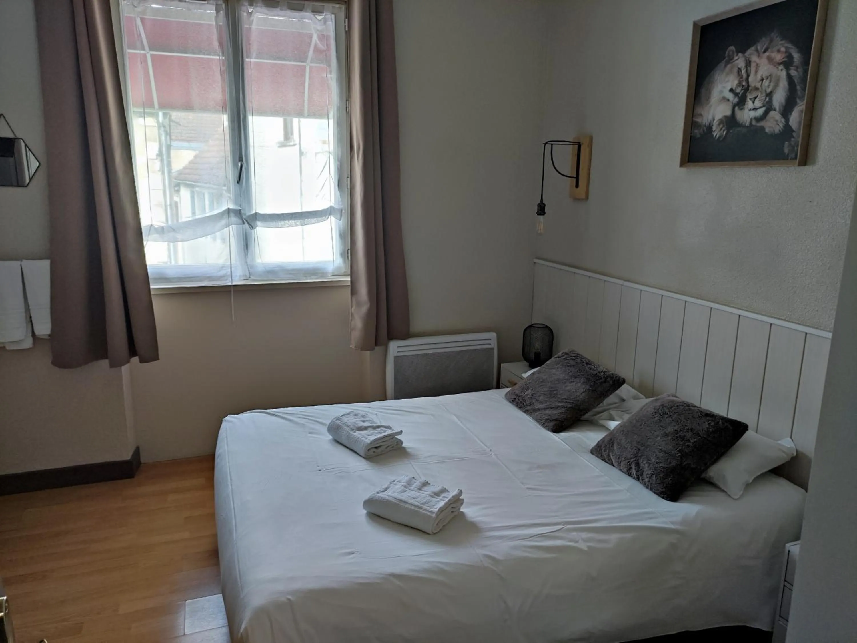 Bed in Hôtel Le P'tit Monde