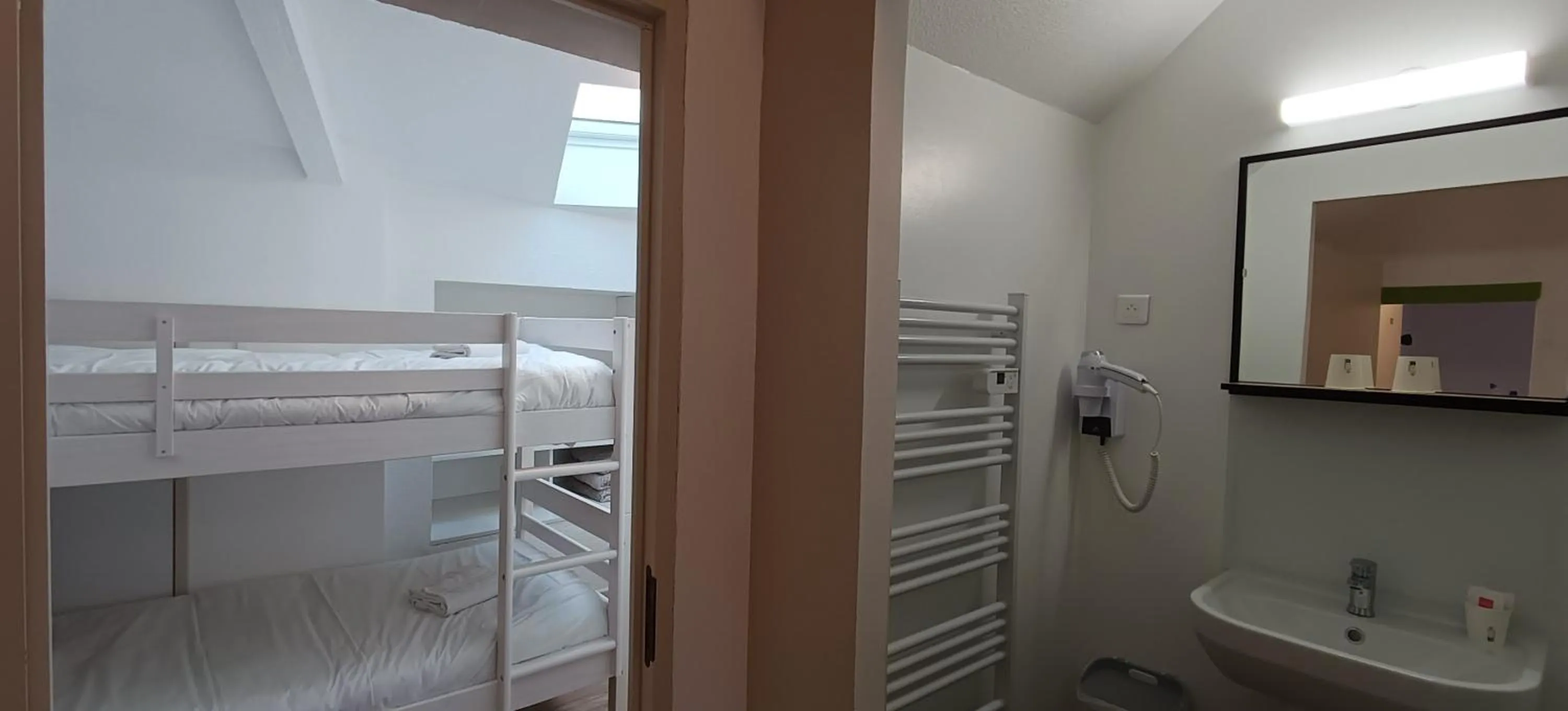 Bed in Hôtel Le P'tit Monde