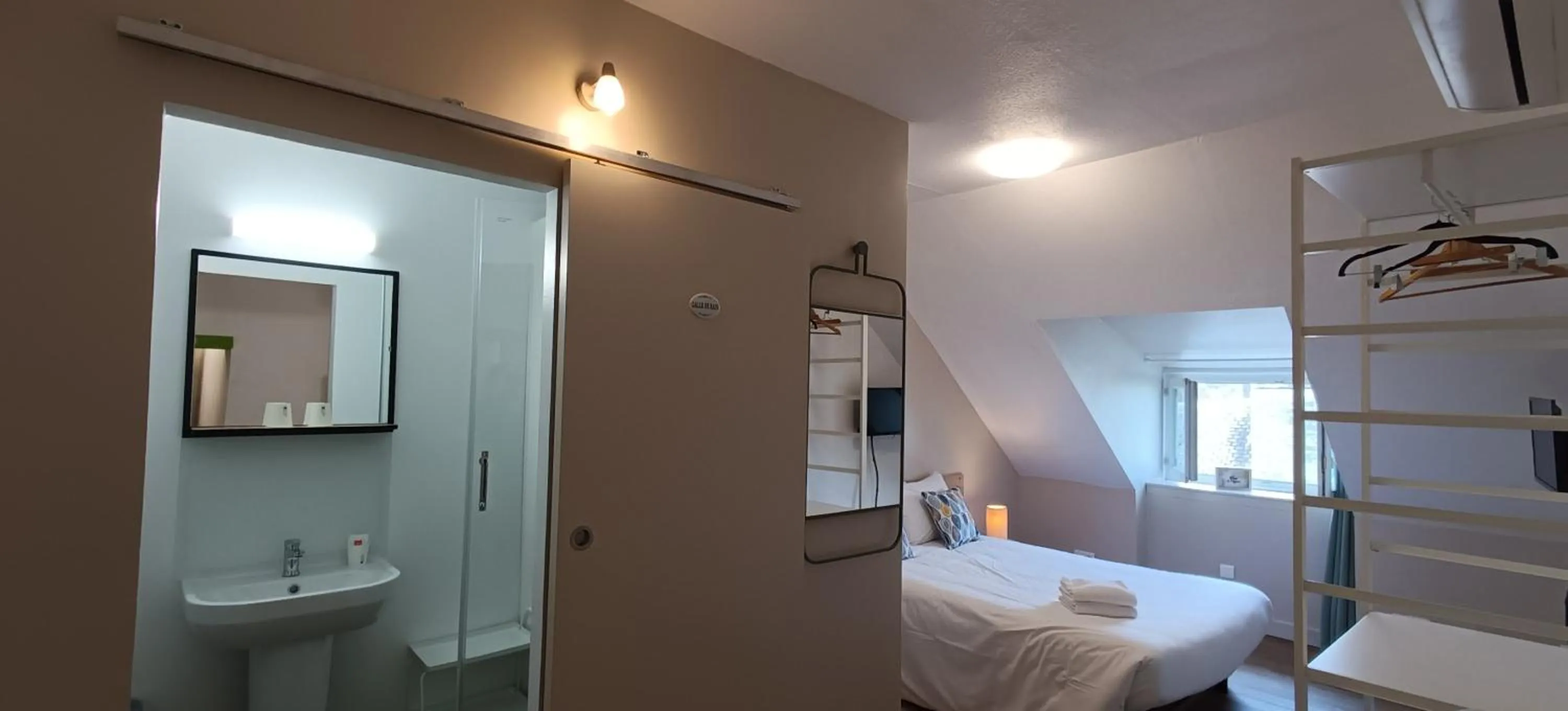 Bed in Hôtel Le P'tit Monde