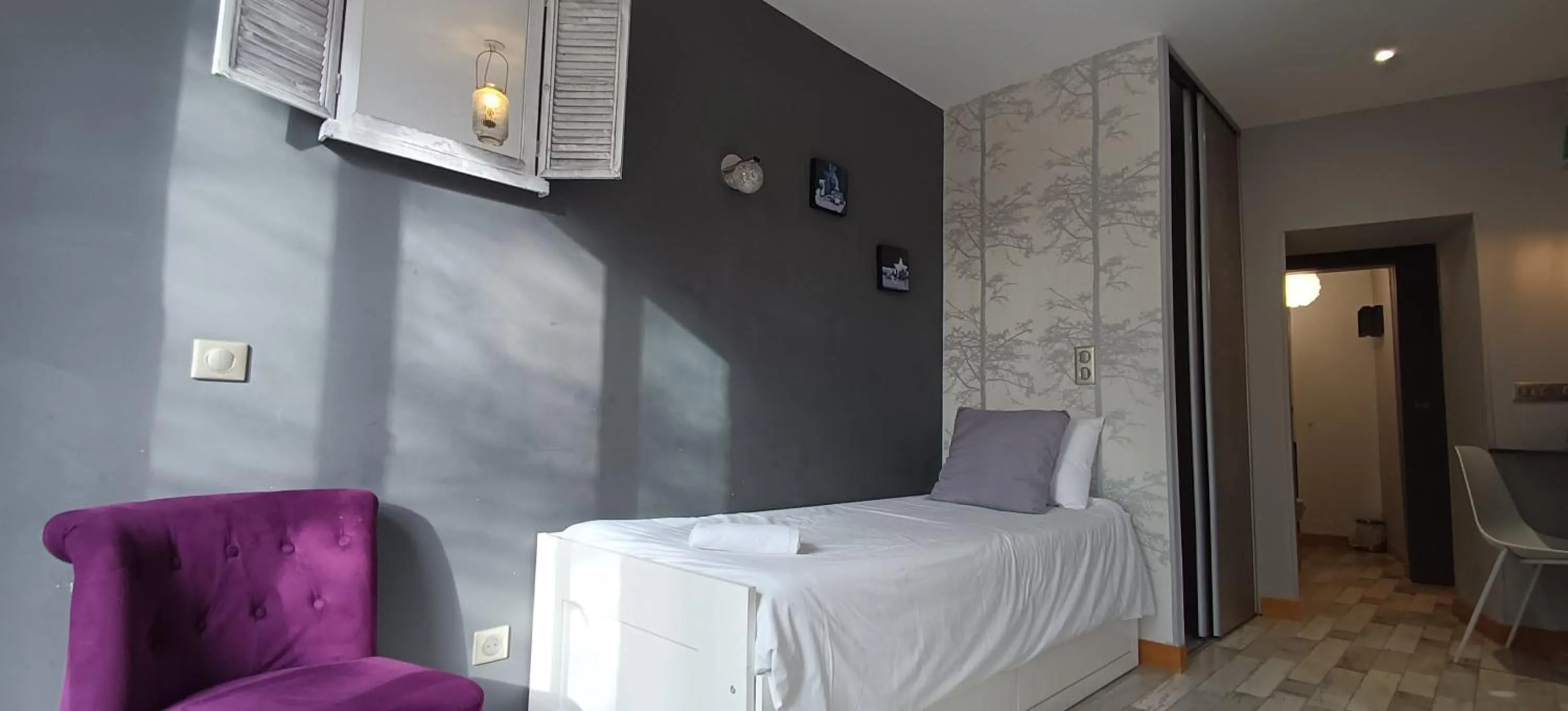 Bed in Hôtel Le P'tit Monde