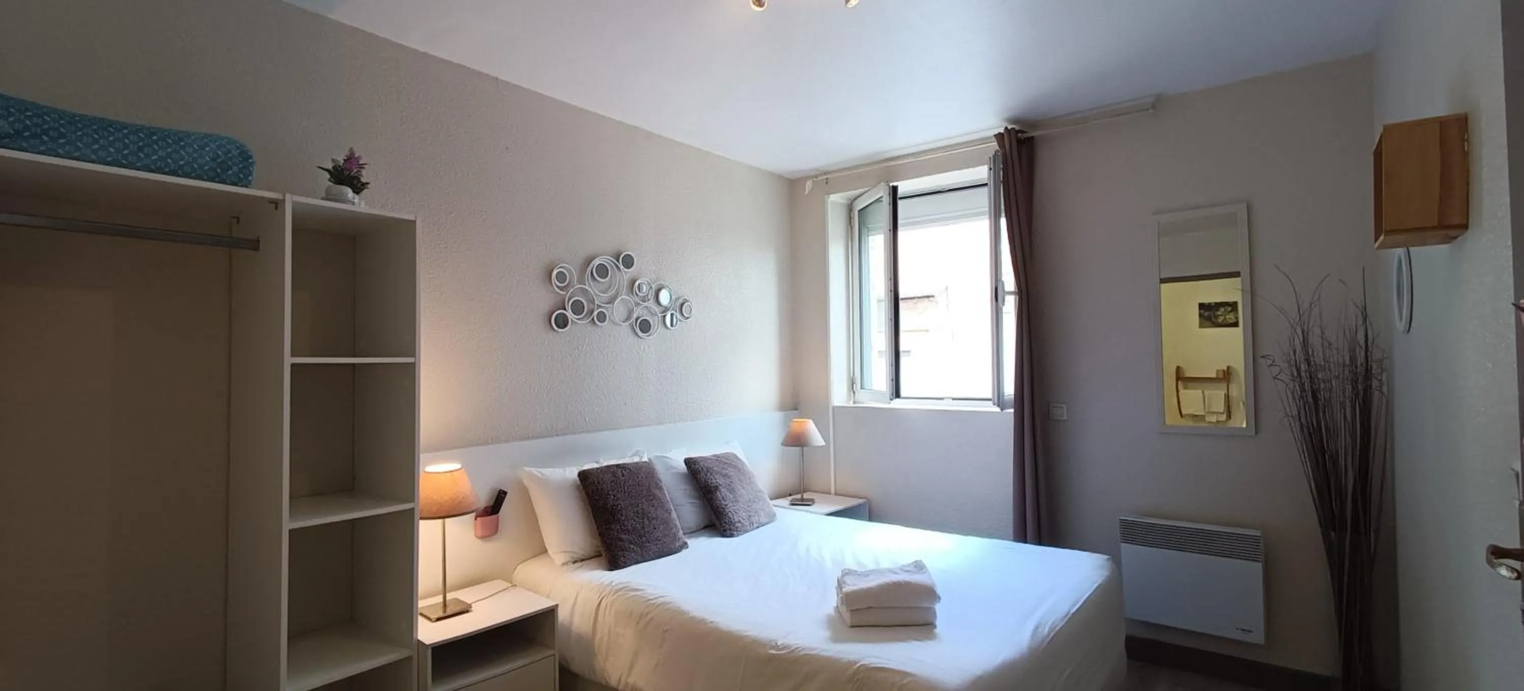 Bed in Hôtel Le P'tit Monde