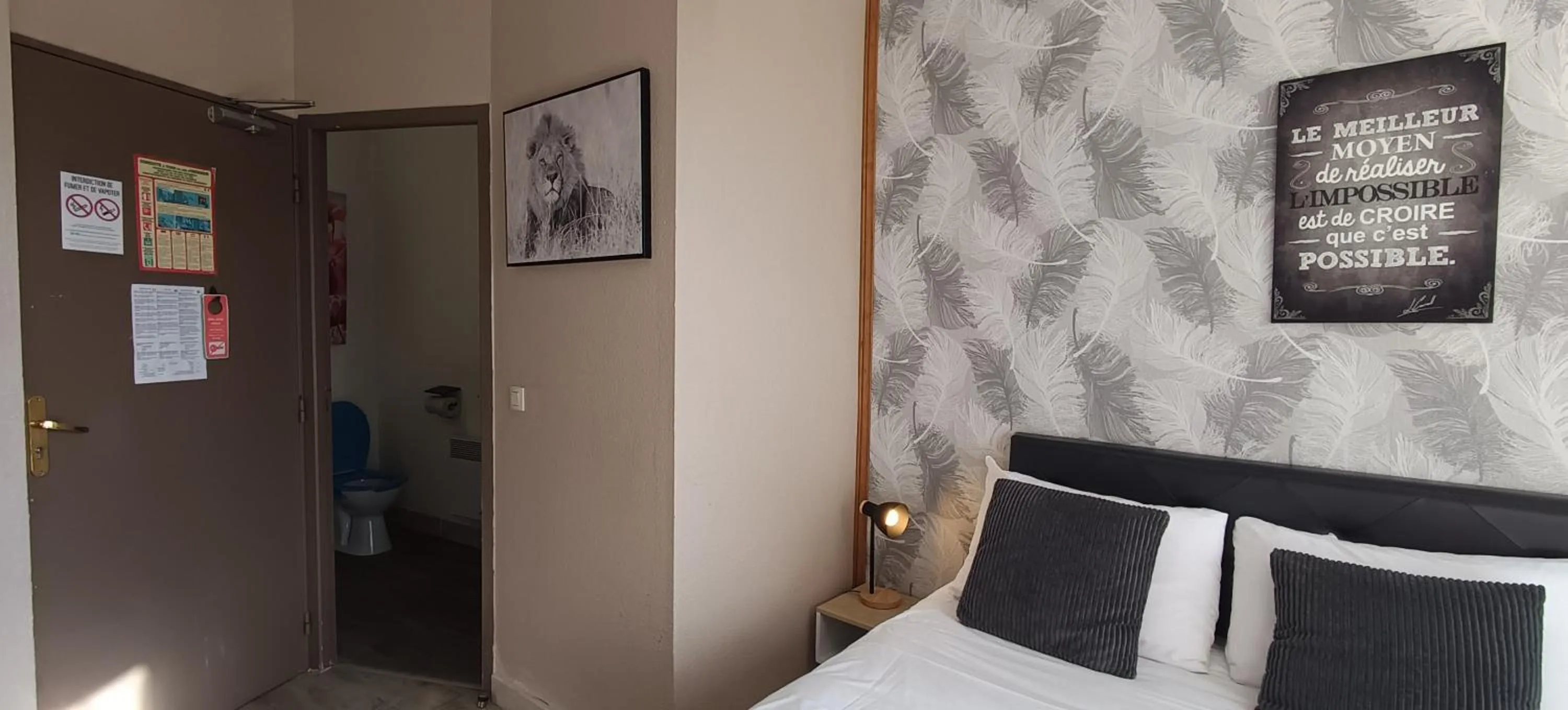 Bed in Hôtel Le P'tit Monde