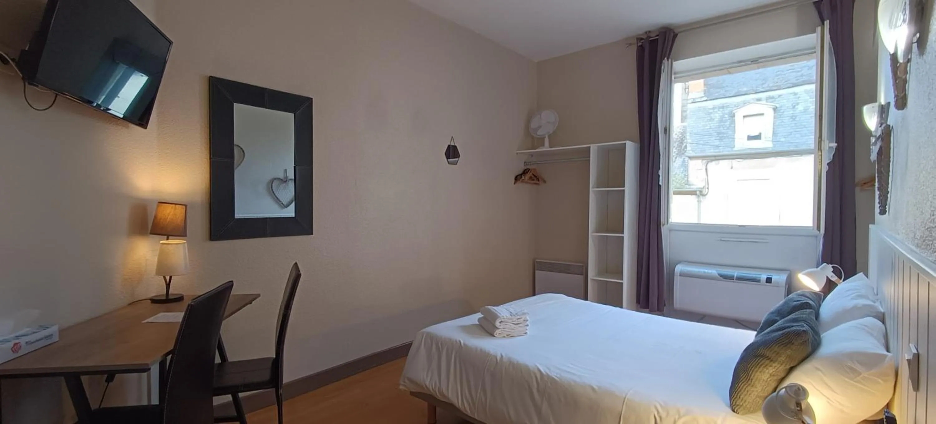 Bed in Hôtel Le P'tit Monde